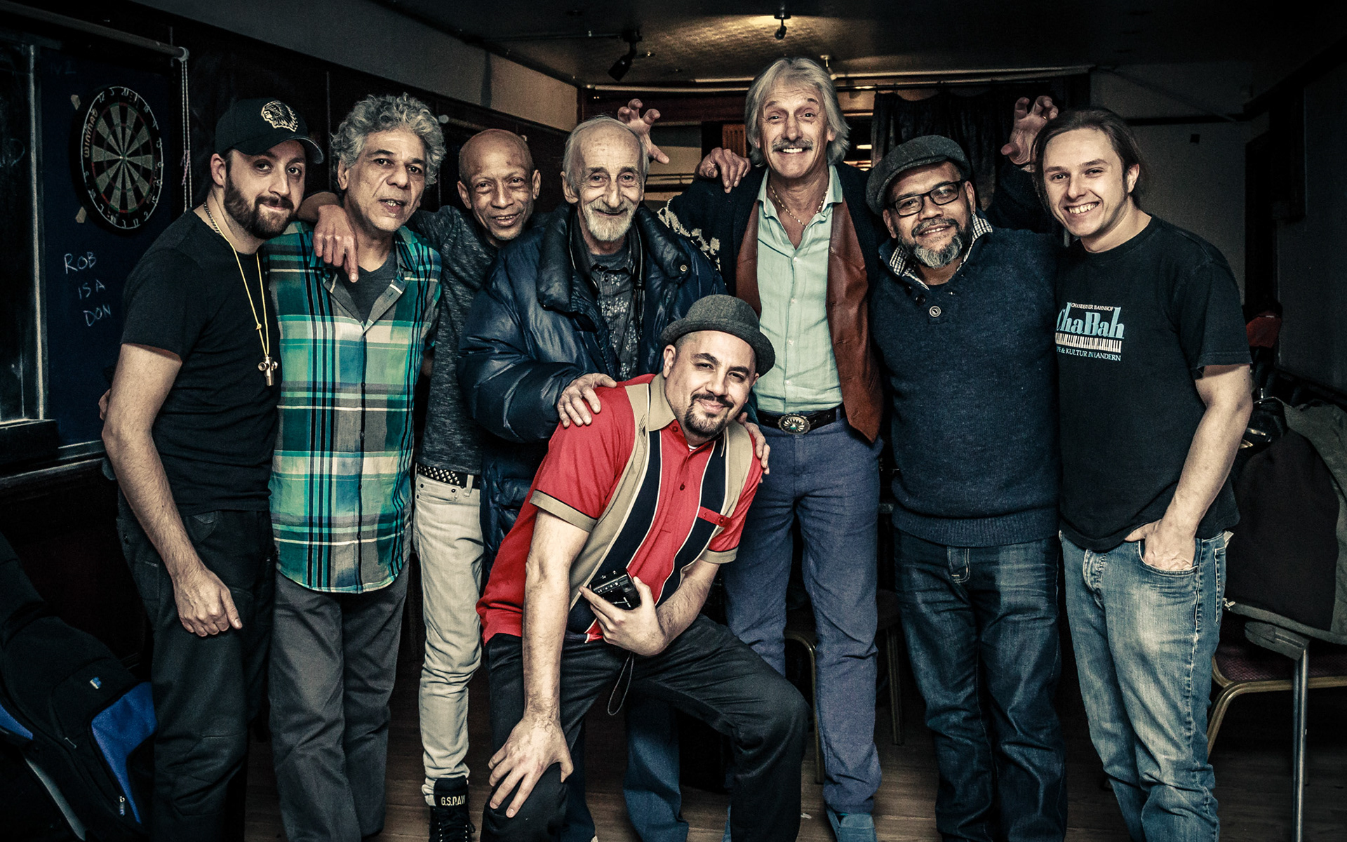 2016-03 UK - London 0624: Members of The RumBand - Alan Mian, Richard Bailey, Darryl Lee Que, Mick Eave, David Mian (front), James Lascelles, Felix Ruiz, Paul Jobson - during their live video recording performance at The Prince of Wales Pub