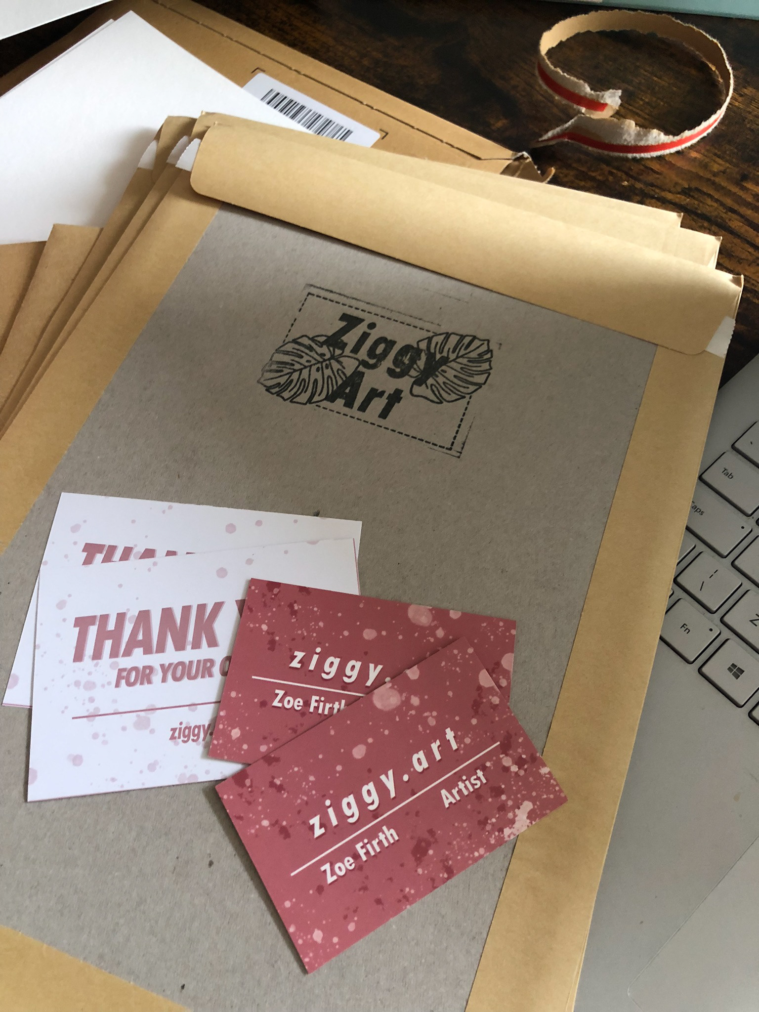 Examples of old branding (stamp and business cards)