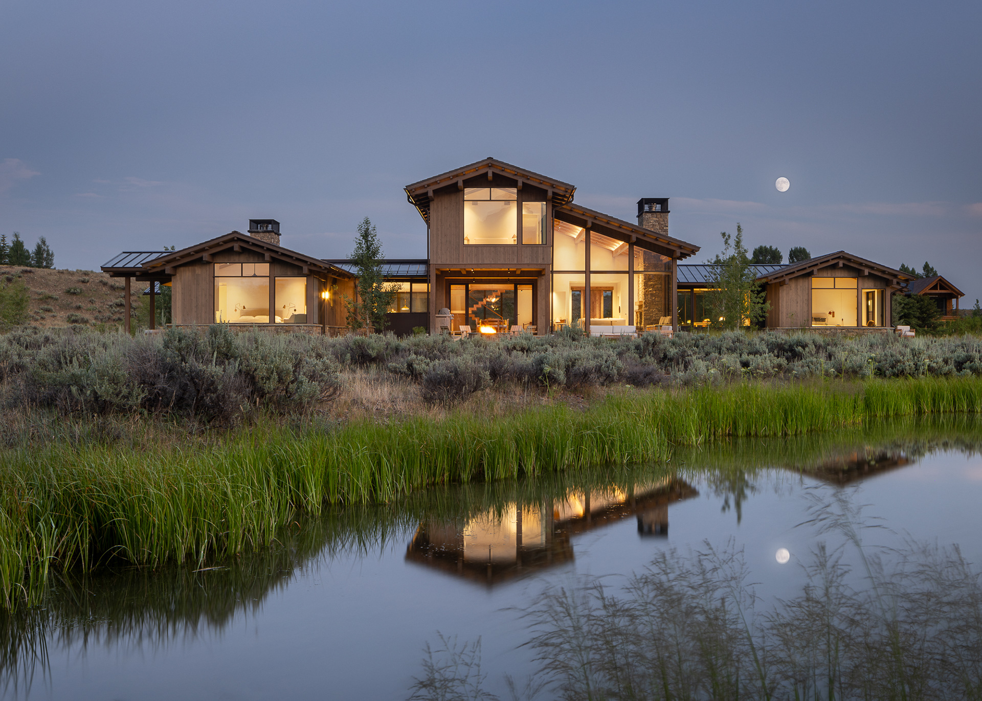 A modern mountain chalet in Jackson Hole, Wyoming designed by Berlin Architects and Cairn Landscape architects. Photography by Aaron Kraft Krafty Photos, Winter and summer architecture photography, landscape architecture photography, interior design photography