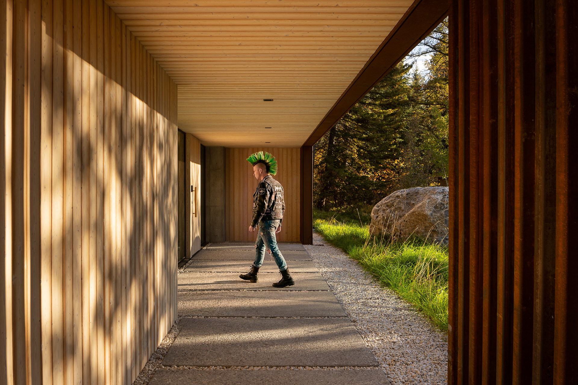 A modern home designed by clb architects in a fall setting in the forest. Photography by Aaron Kraft Krafty Photos
