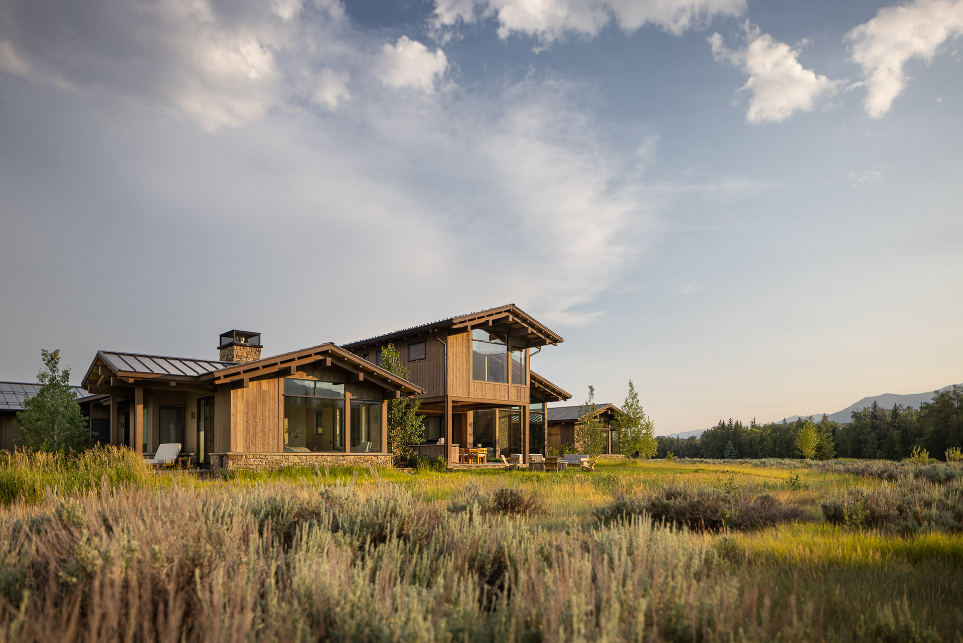 A modern mountain chalet in Jackson Hole, Wyoming designed by Berlin Architects and Cairn Landscape architects. Photography by Aaron Kraft Krafty Photos, Winter and summer architecture photography, landscape architecture photography, interior design photography