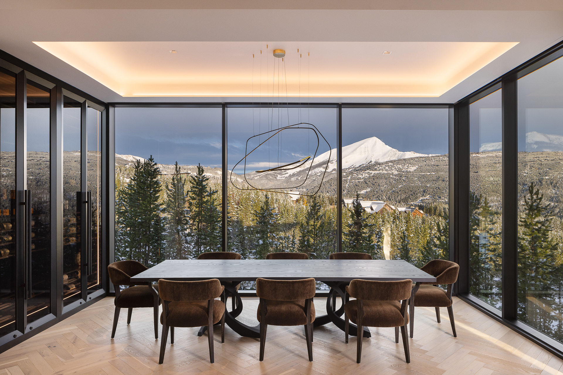 Big Sky Home at the Yellowstone Club in Big Sky, Montana.  Wintry scenes of a modern home designed by Reid Smith Architects with interior design by PFH Design. Twilight photography, Interior design photography, architecture photography, Photography by Aaron Kraft, Krafty Photos in Jackson Hole, Wyoming