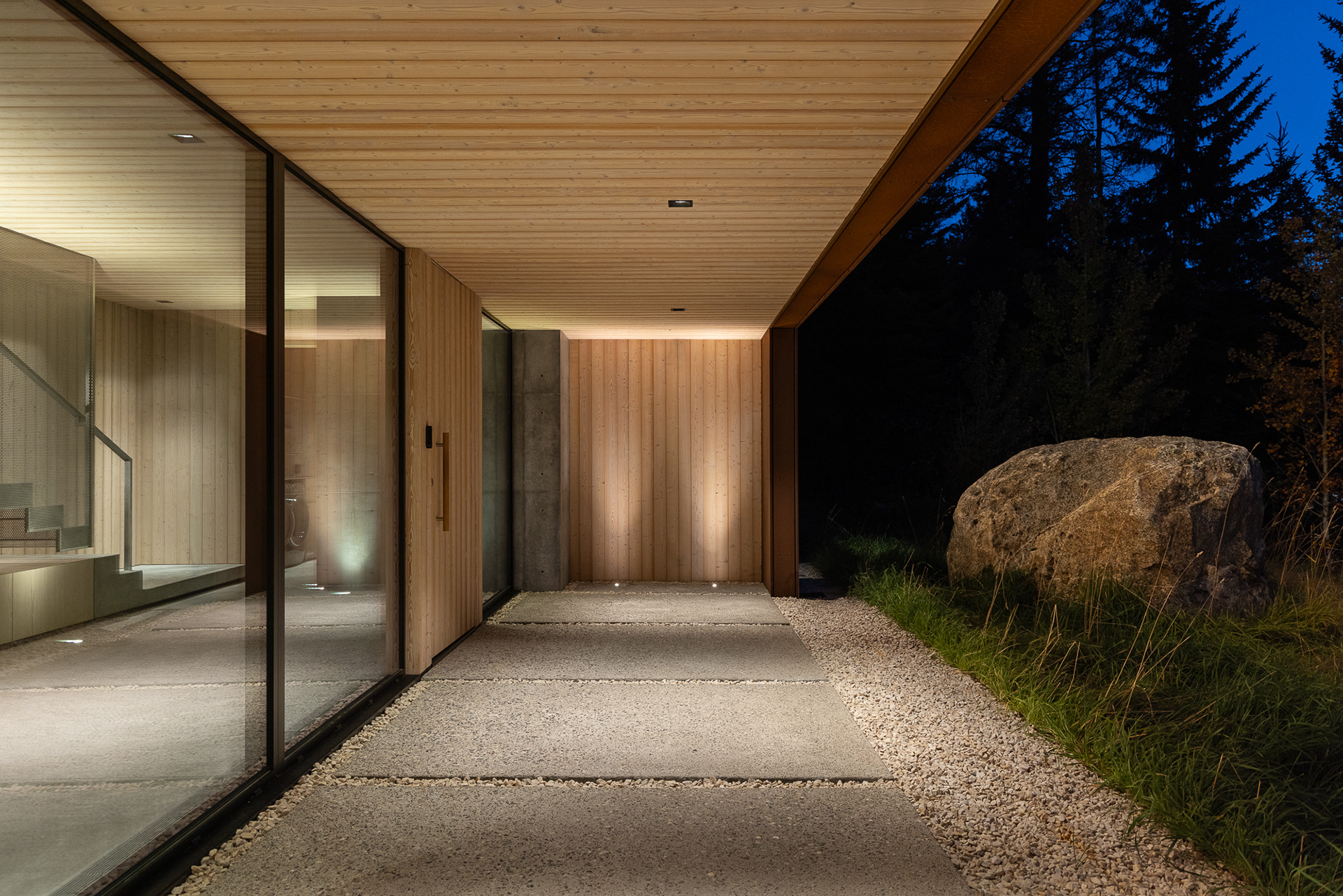 A modern home designed by clb architects in a fall setting in the forest. Photography by Aaron Kraft Krafty Photos