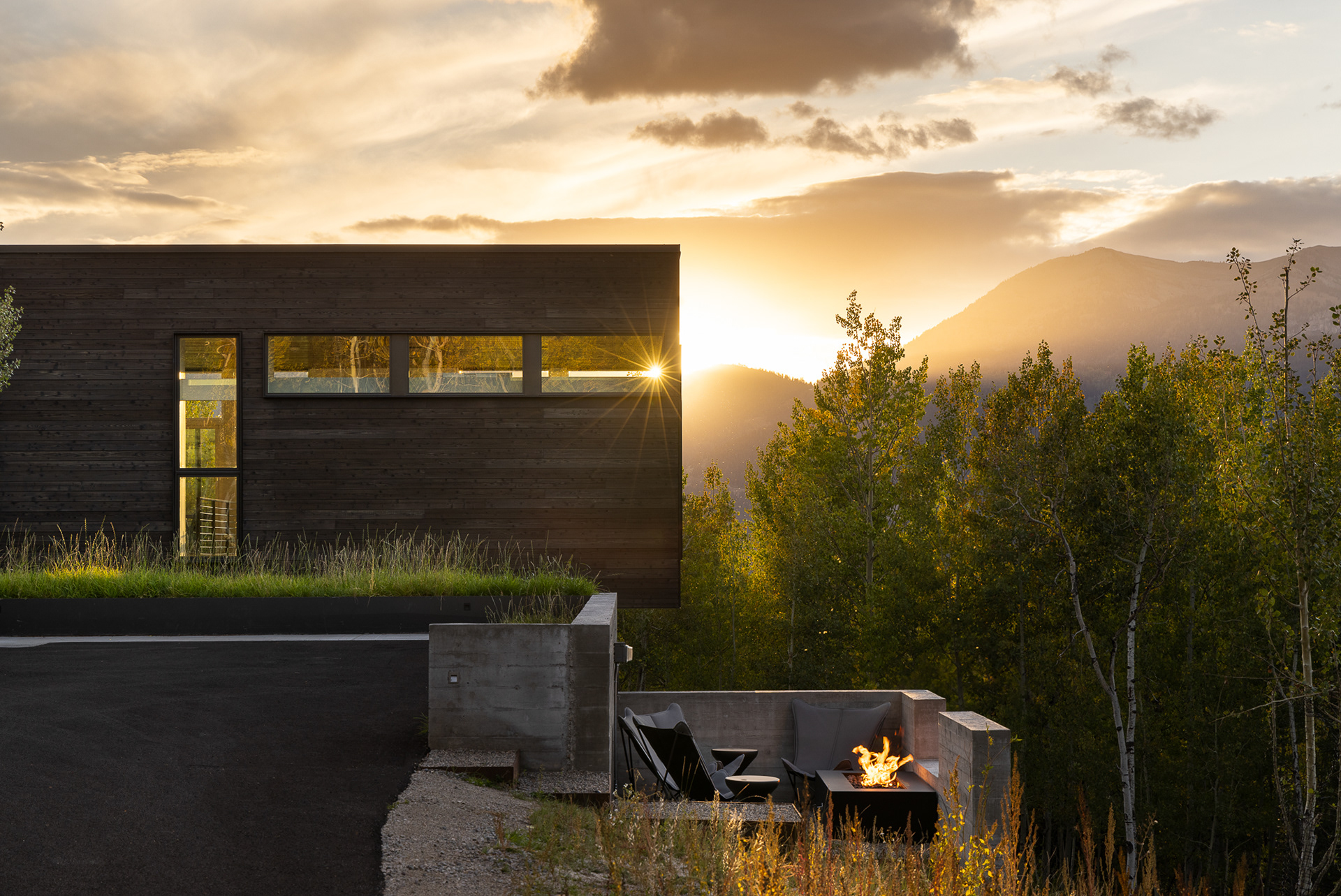 MDR, a modern house in Jackson Hole Wyoming at sunset by Krafty Photos