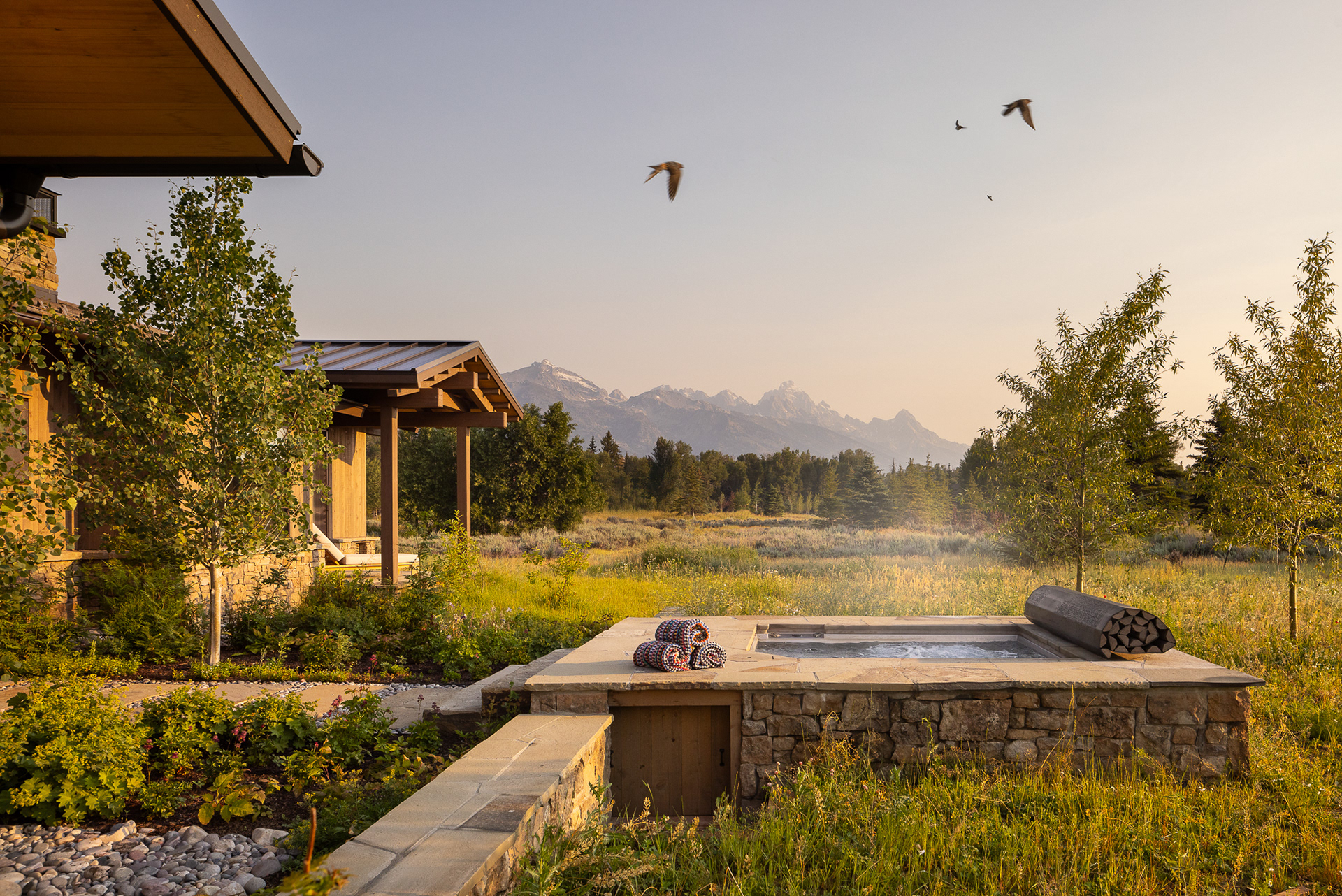 A modern mountain chalet in Jackson Hole, Wyoming designed by Berlin Architects and Cairn Landscape architects. Photography by Aaron Kraft Krafty Photos, Winter and summer architecture photography, landscape architecture photography, interior design photography