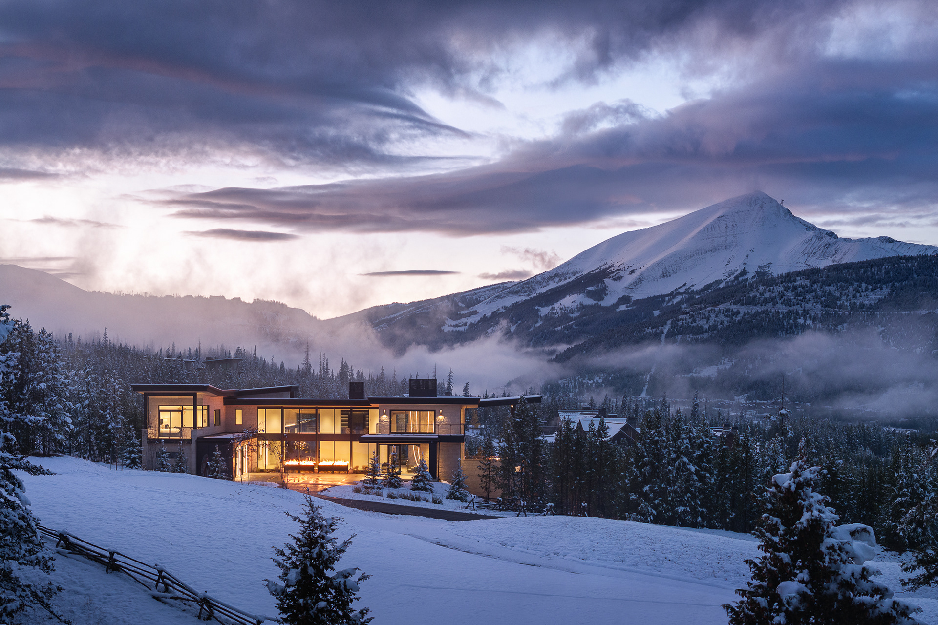 Big Sky Home at the Yellowstone Club in Big Sky, Montana.  Wintry scenes of a modern home designed by Reid Smith Architects with interior design by PFH Design. Twilight photography, Interior design photography, architecture photography, Photography by Aaron Kraft, Krafty Photos in Jackson Hole, Wyoming