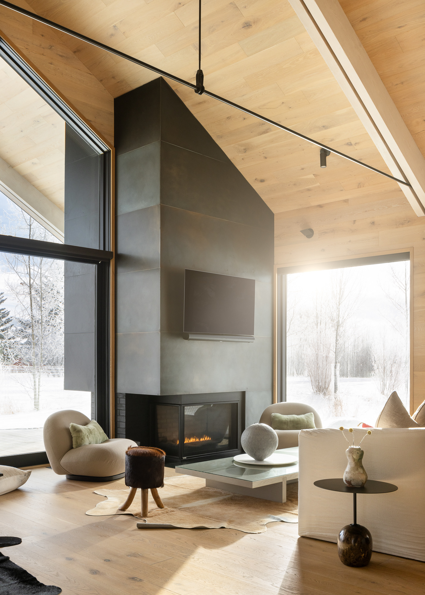 Winter sunrise in a modern home in Jackson, Wyoming designed by MB Architects