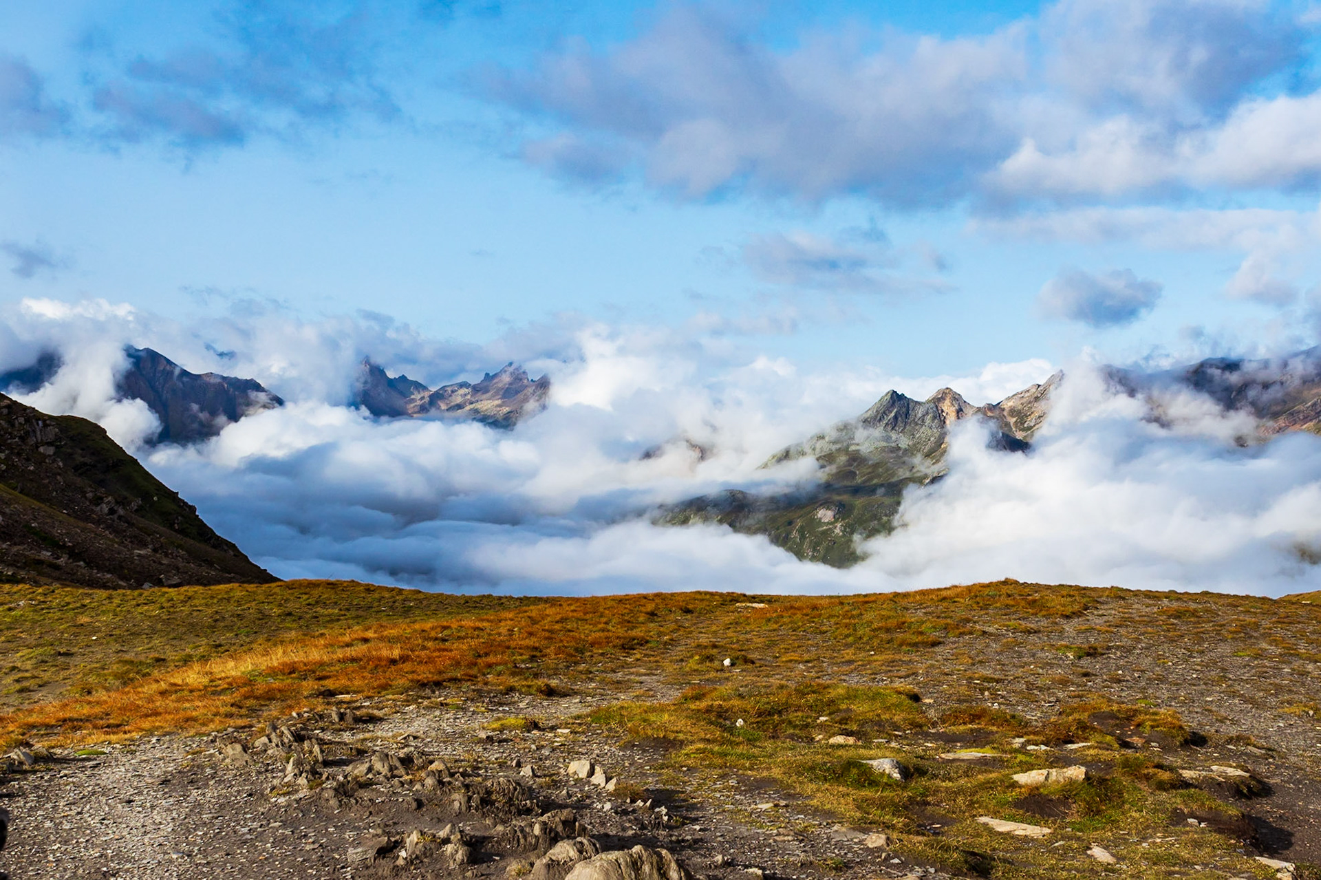 Crossing into France on the TMB, looking towards Tete Nord des Fours from Col de la Seigne