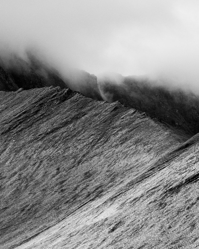 Clouds blowing in over the ridgeline on a morning on the TMB.