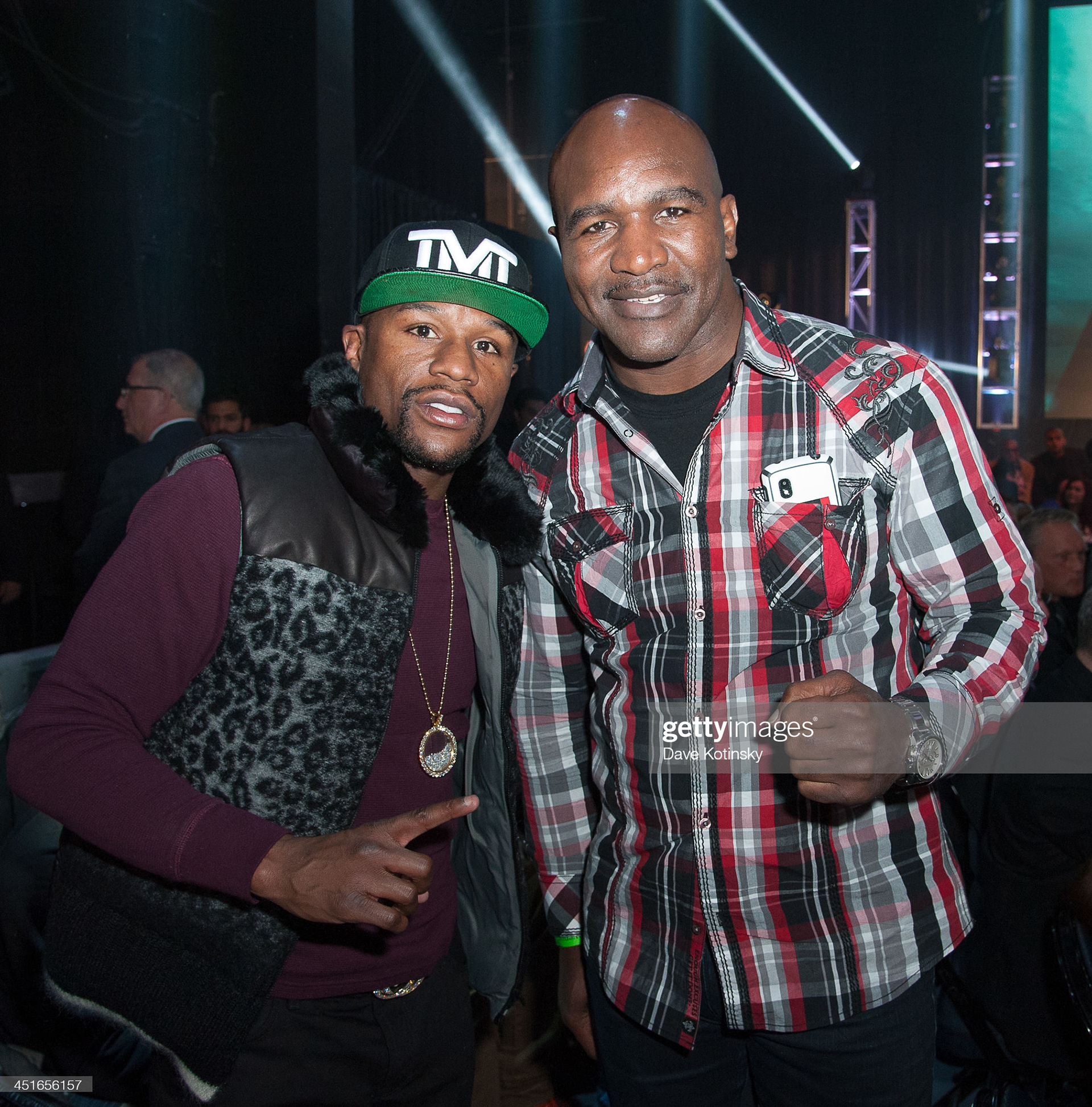 Floyd Mayweather(L) and Evander Holyfield(R) attend the GLORY12 at The Theater at Madison Square Garden on November 23, 2013 in New York City. (Photo by Dave Kotinsky/WireImage for GSI)