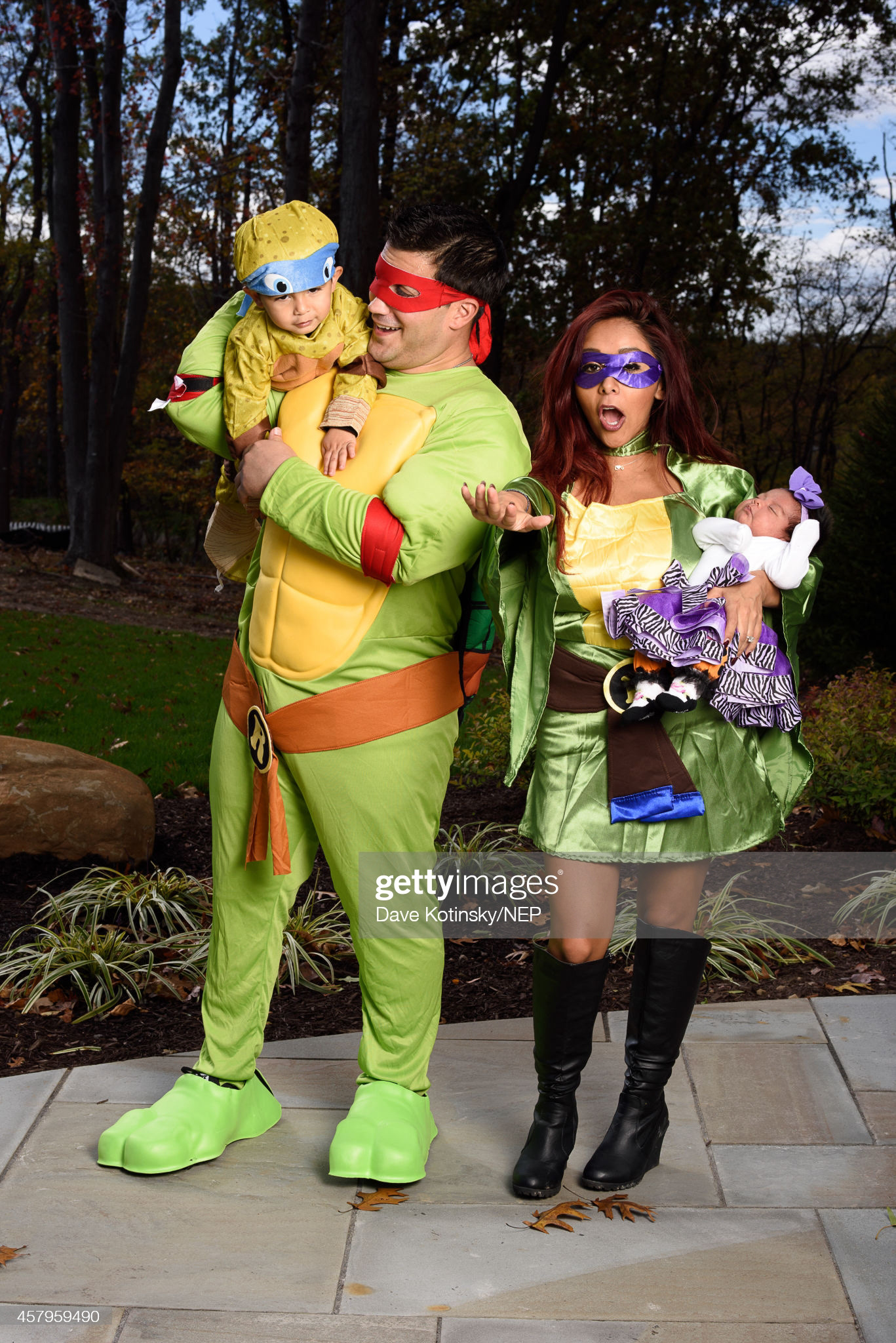 (EXCLUSIVE COVERAGE, SPECIAL RATES APPLY) (L-R) Jionni LaValle, Lorenzo LaValle, Giovanna Marie LaValle and Nicole "Snooki" Polizzi in their Teenage Mutant Ninja Costumes from Rubie's Costumes as they dress up for Halloween on October 24, 2014 in Whippany, New Jersey. (Photo by Dave Kotinsky/NEP/Getty Images for Hired Gun Publicity & Consulting)