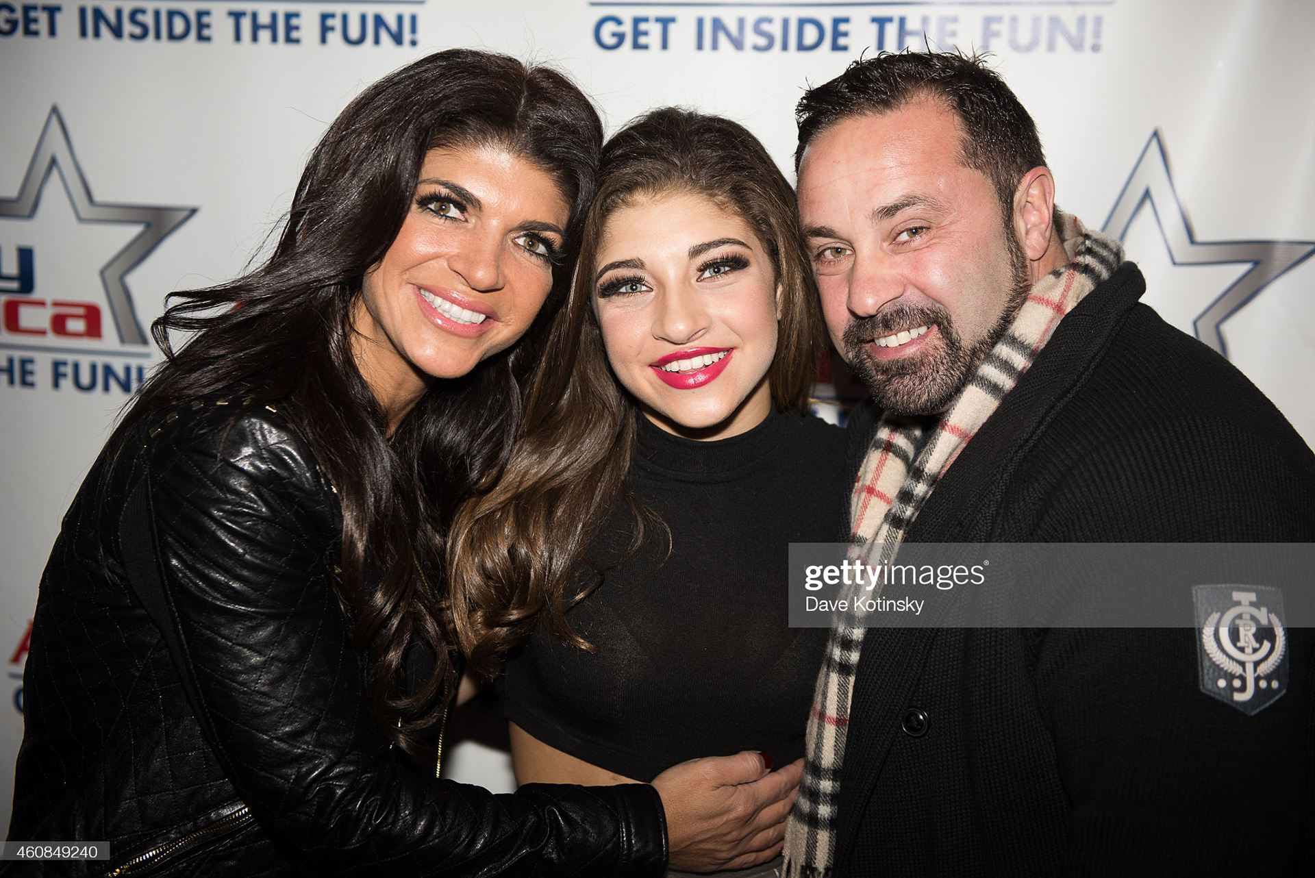 Teresa Giudice, Gia Giudice and Joe Giudice pose at iPlay America on December 26, 2014 in Freehold, New Jersey. (Photo by Dave Kotinsky/Getty Images)