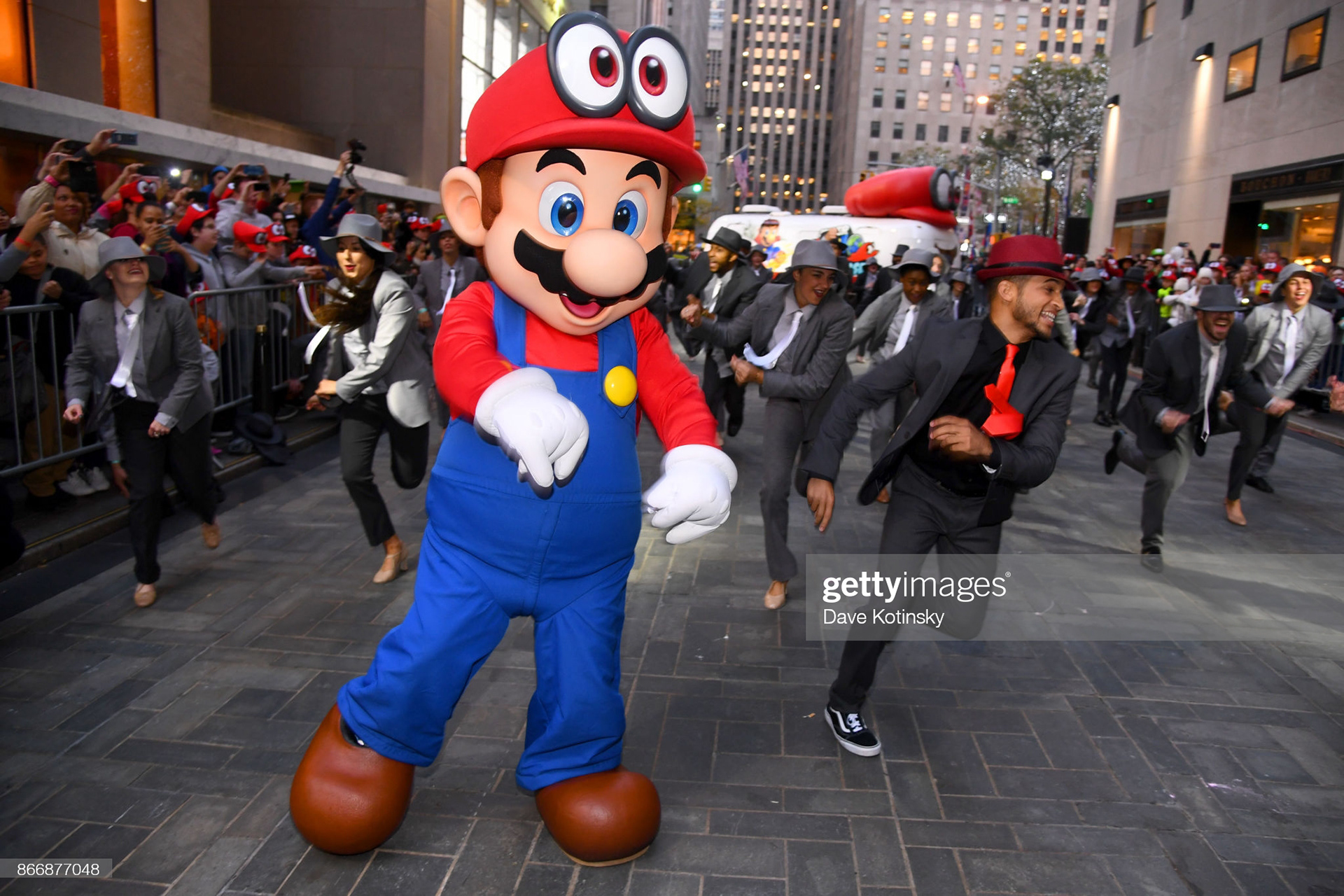 Mario and Jordan Fisher, actor, recording artist and current contestant on Dancing with the Stars co-hosts the Super Mario Odyssey for Nintendo Switch launch event on October 26, 2017 at Rockefeller Plaza in New York City. (Photo by Dave Kotinsky/Getty Images for Nintendo of America)