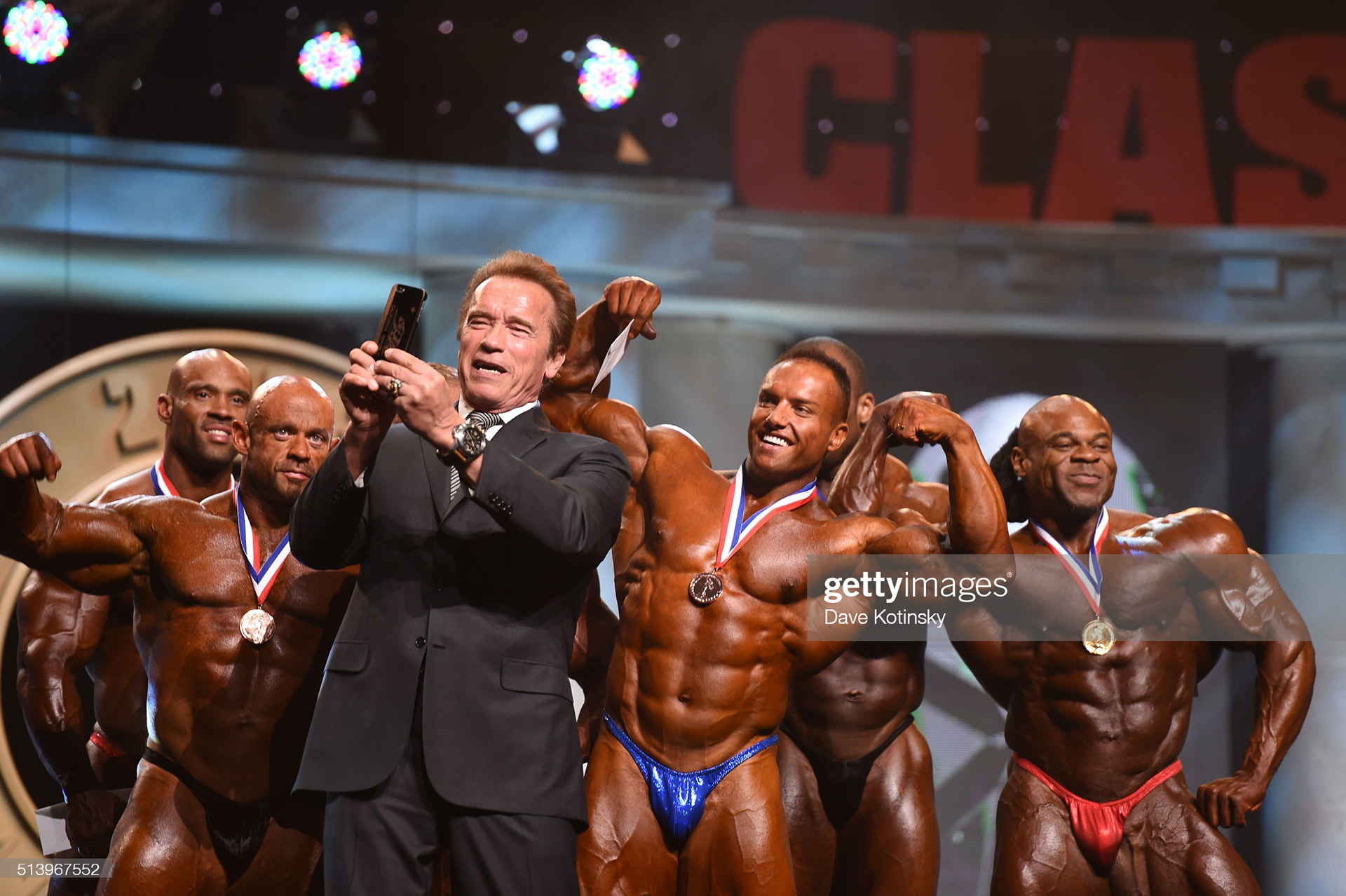 Arnold Schwarzenegger takes a photo with then winner's of the Arnold Classic at the Arnold Sports Festival 2016 on March 5, 2016 in Columbus, Ohio. (Photo by Dave Kotinsky/Getty Images)
