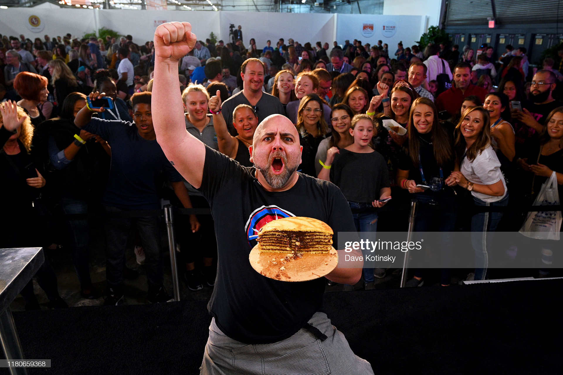  Chef Duff Goldman poses with guests during culinary demonstration at the Grand Tasting presented by ShopRite featuring Culinary Demonstrations at The IKEA Kitchen presented by Capital One at Pier 94 on October 12, 2019 in New York City. (Photo by Dave Kotinsky/Getty Images for NYCWFF)