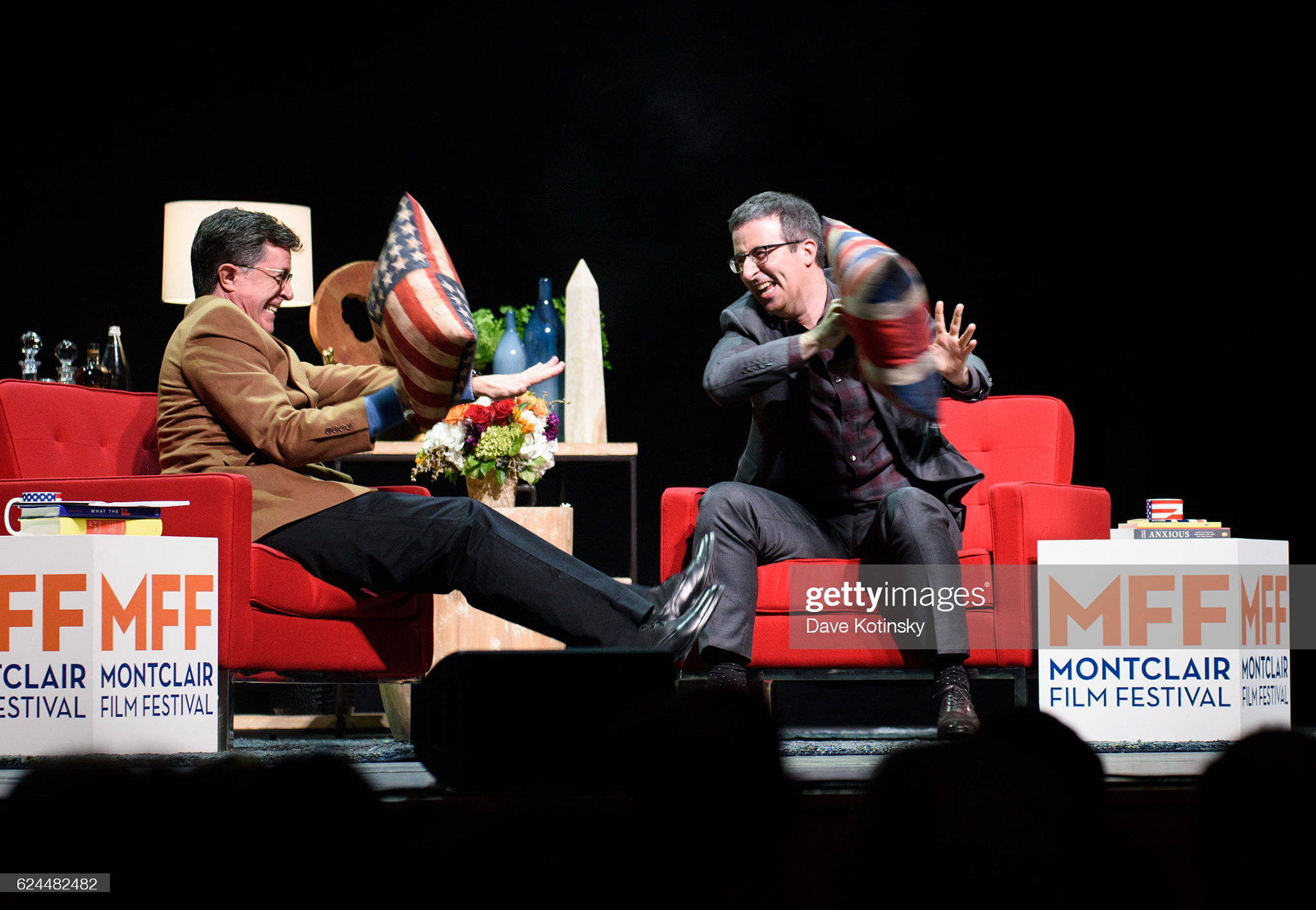 Stephen Colbert(L) and John Oliver (R) onstage at the Post-Election Evening to Benefit Montclair Film Festival at NJ Performing Arts Center on November 19, 2016 in Newark, New Jersey. (Photo by Dave Kotinsky/Getty Images for Montclair Film Festival)
