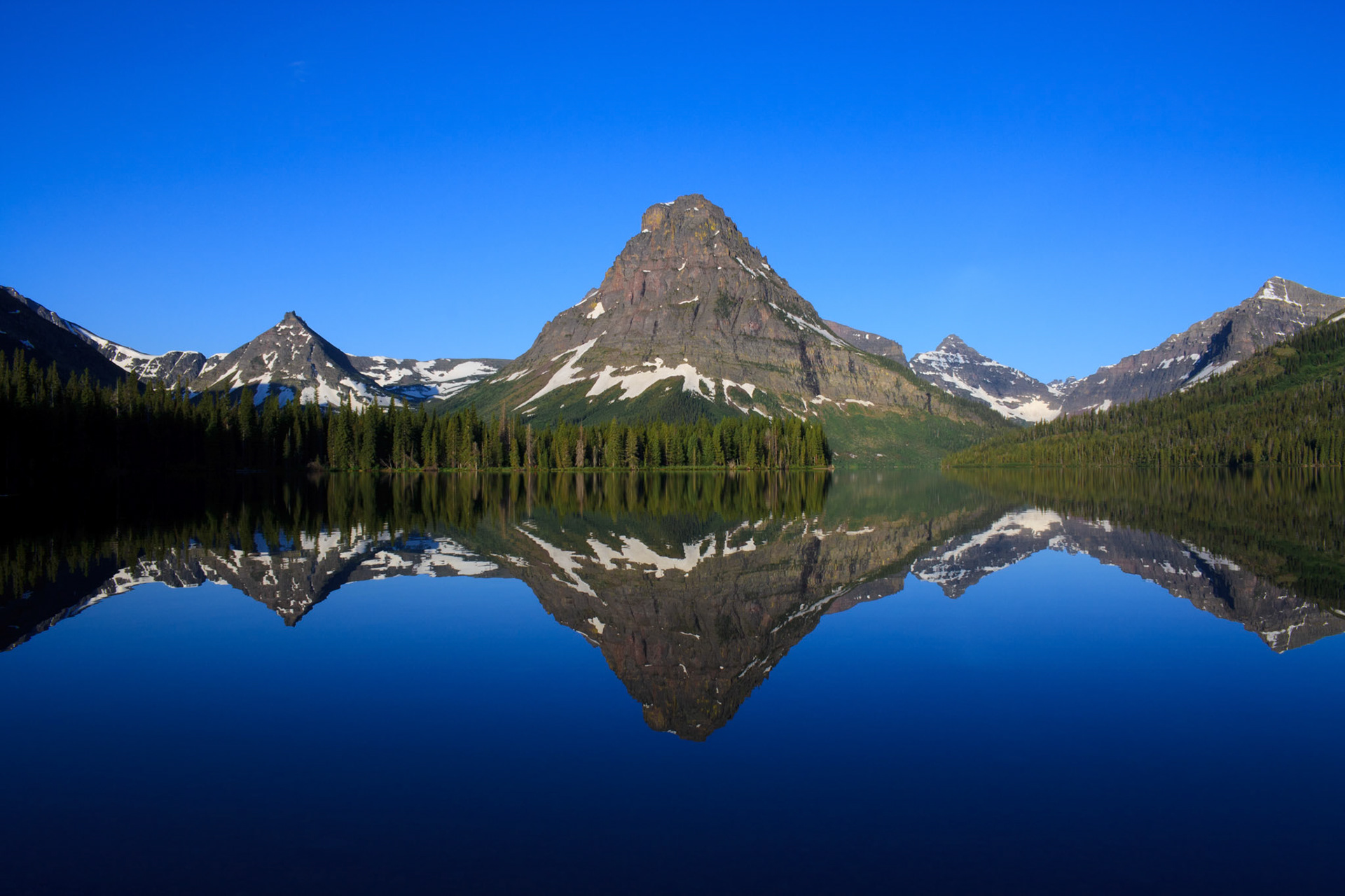 Sinopah Mountain reflected in Two Medicine Lake, Glacier National Park, Montana