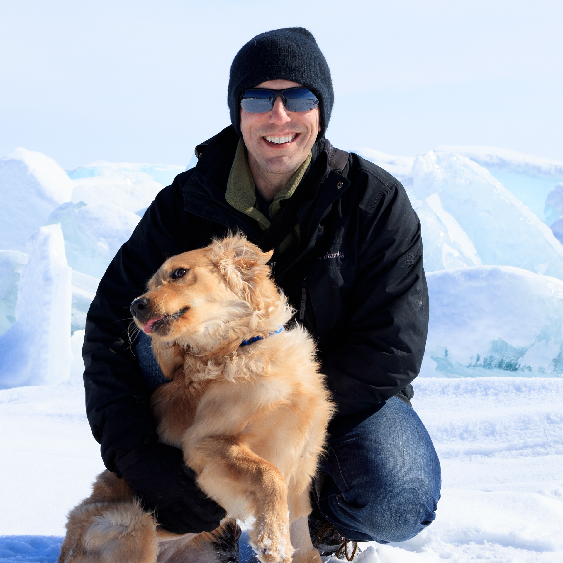Daniel Arthur Brown and his golden retriever, Granger, enjoying blue ice on Lake Huron, 2019.
