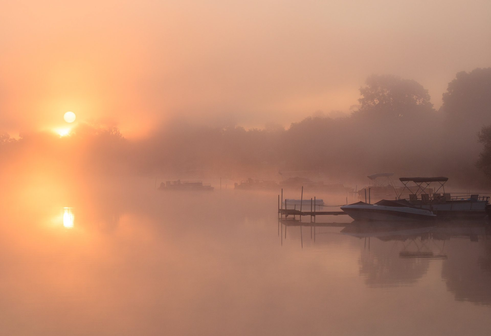 Sunrise through the morning fog, Whitmore Lake, Michigan