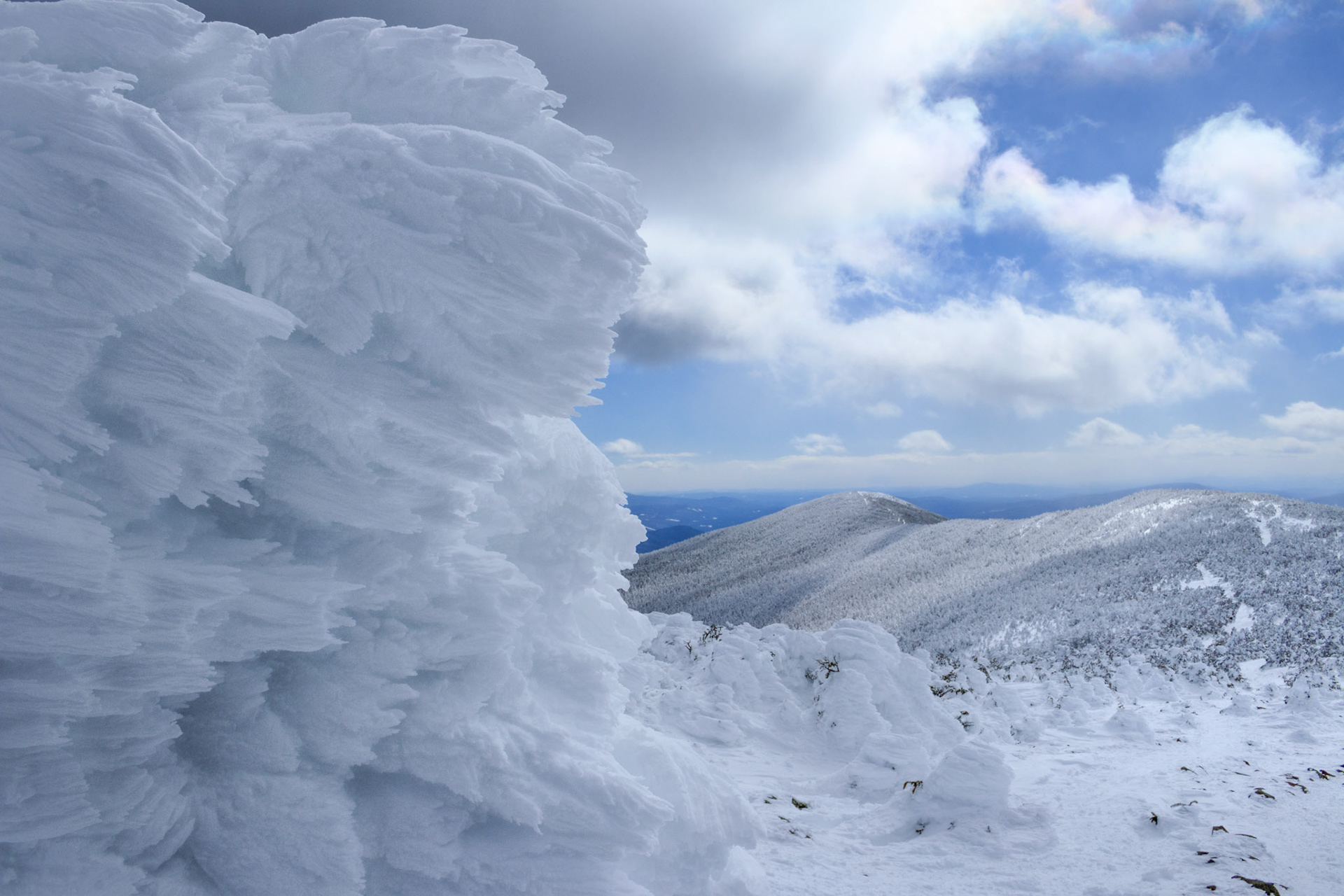 Drifted snow on the Trail Cairn, Mount Moosilauke Glencliff Trail, White Mountain National Forest, New Hampshire