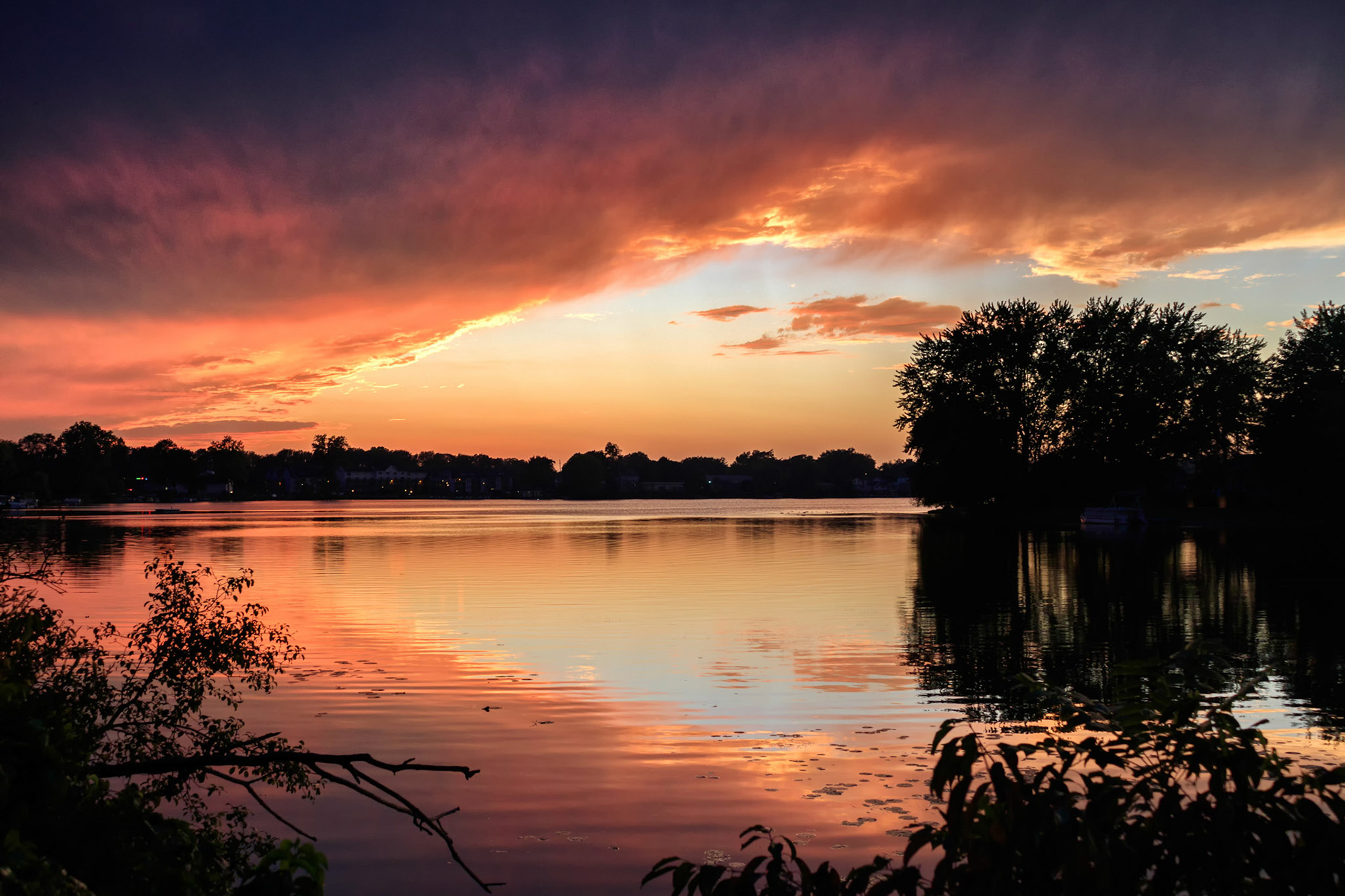 Sunset under a storm over Whitmore Lake, Michigan