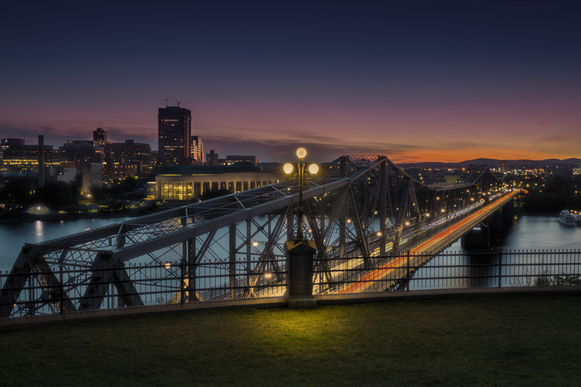 Sunset view of the Alexandra Bridge at Nepean Point in Ottawa