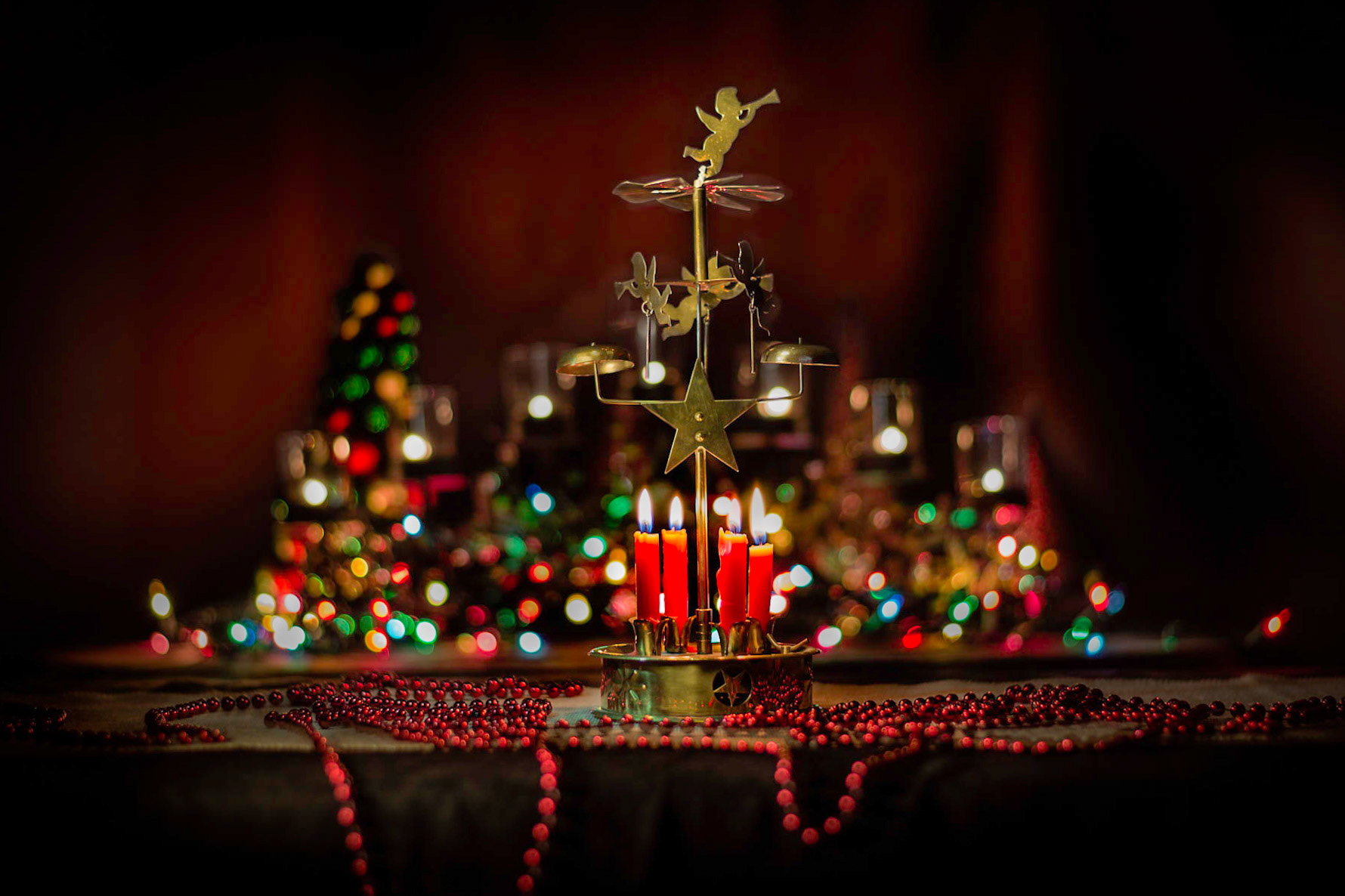 I suppose we all have that one ornament that reminds us of childhood Christmases. For me it's this music box Angel. When you lit the candles the angels would move around and the little metal pieces would 'ting' on the bells, all the while Silent Night would play until the spring wound down. Then you'd turn the winder and it would play again for several minutes.This is Christmas Angel.