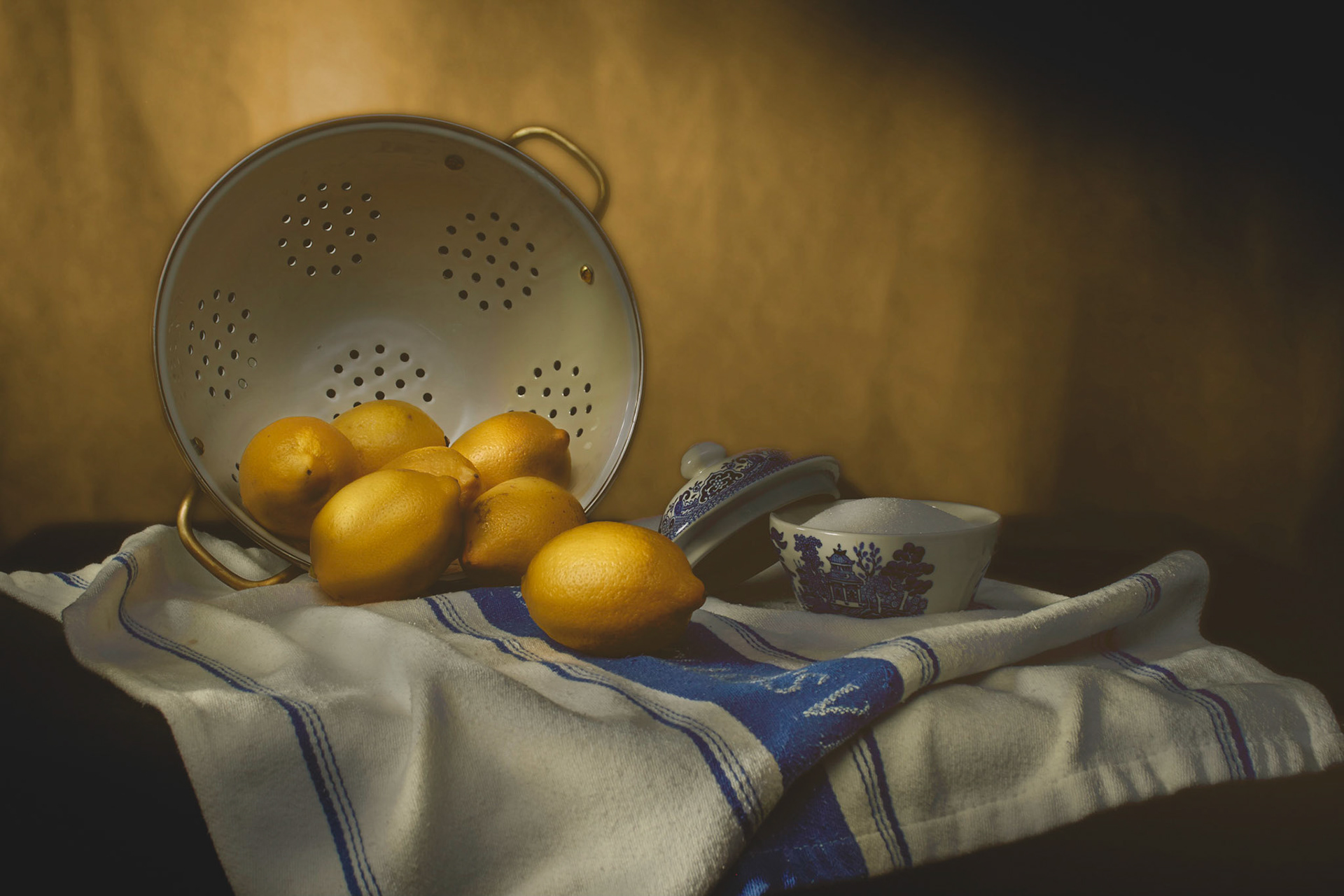 Still life study of lemons on a towel