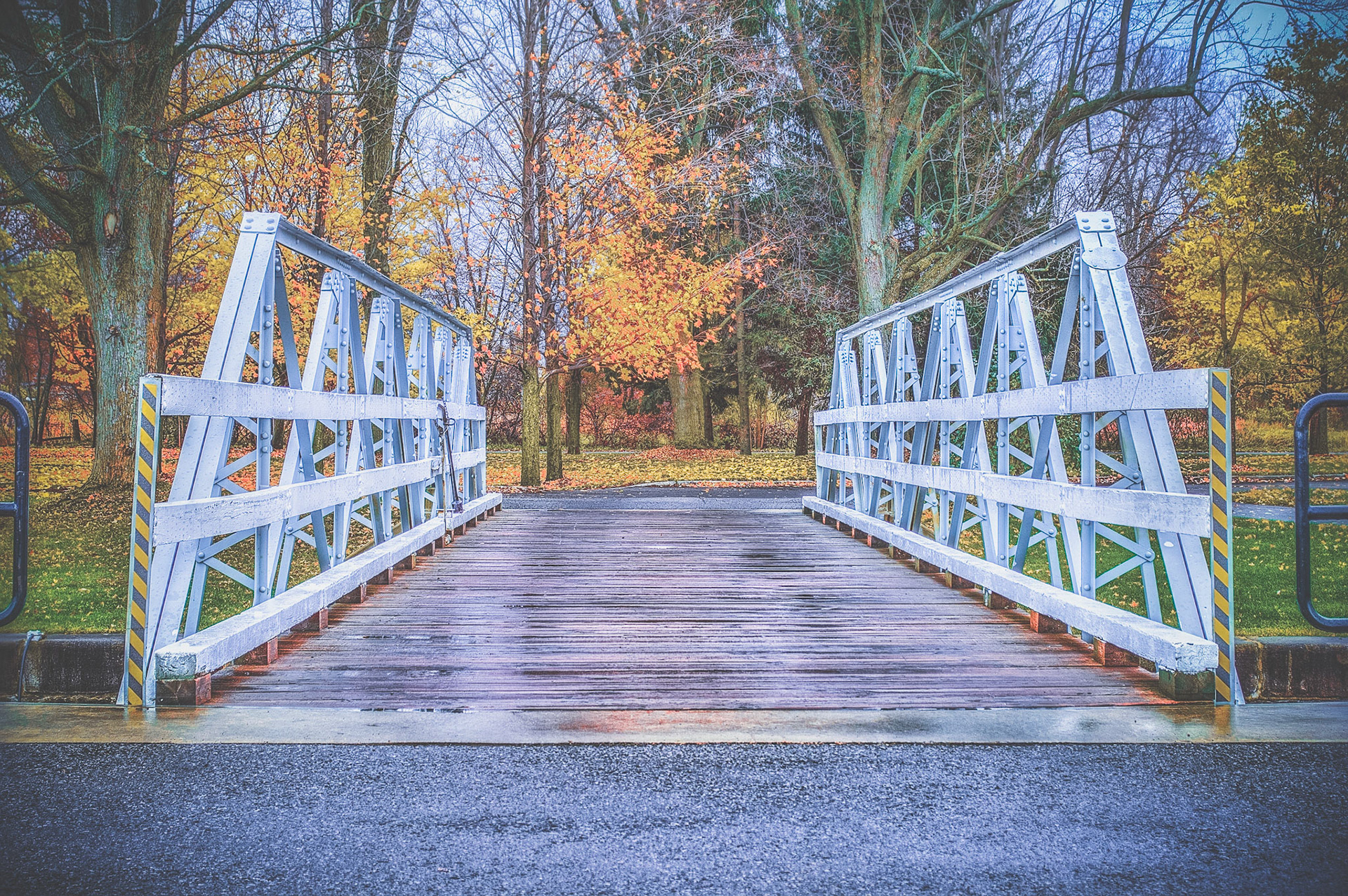The bridge over the canal in Manotick in the Autumn after a rain.