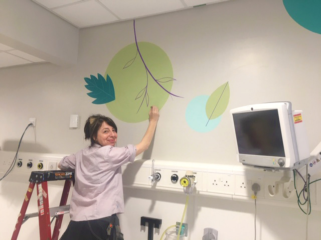 Lynne Hollingsworth Painting Mural in SCBU Sheffield