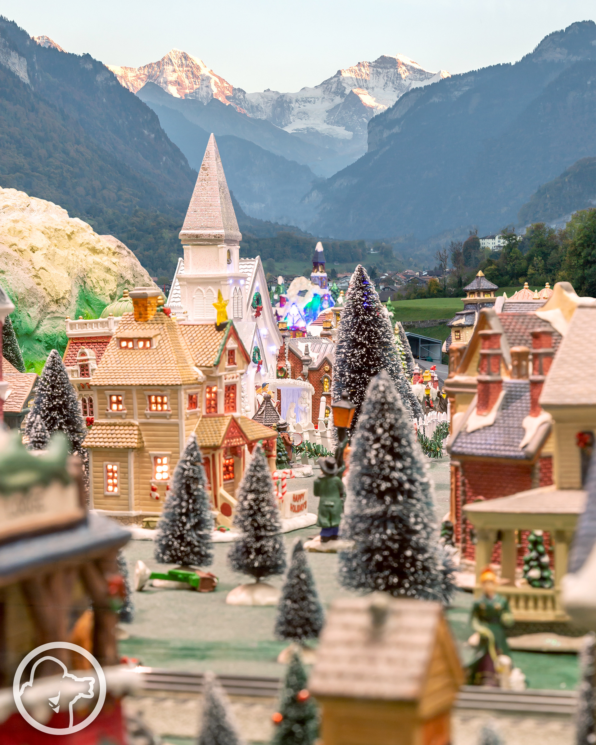 Train Board Village, Photoshopped into the Alps in Interlaken, Switzerland