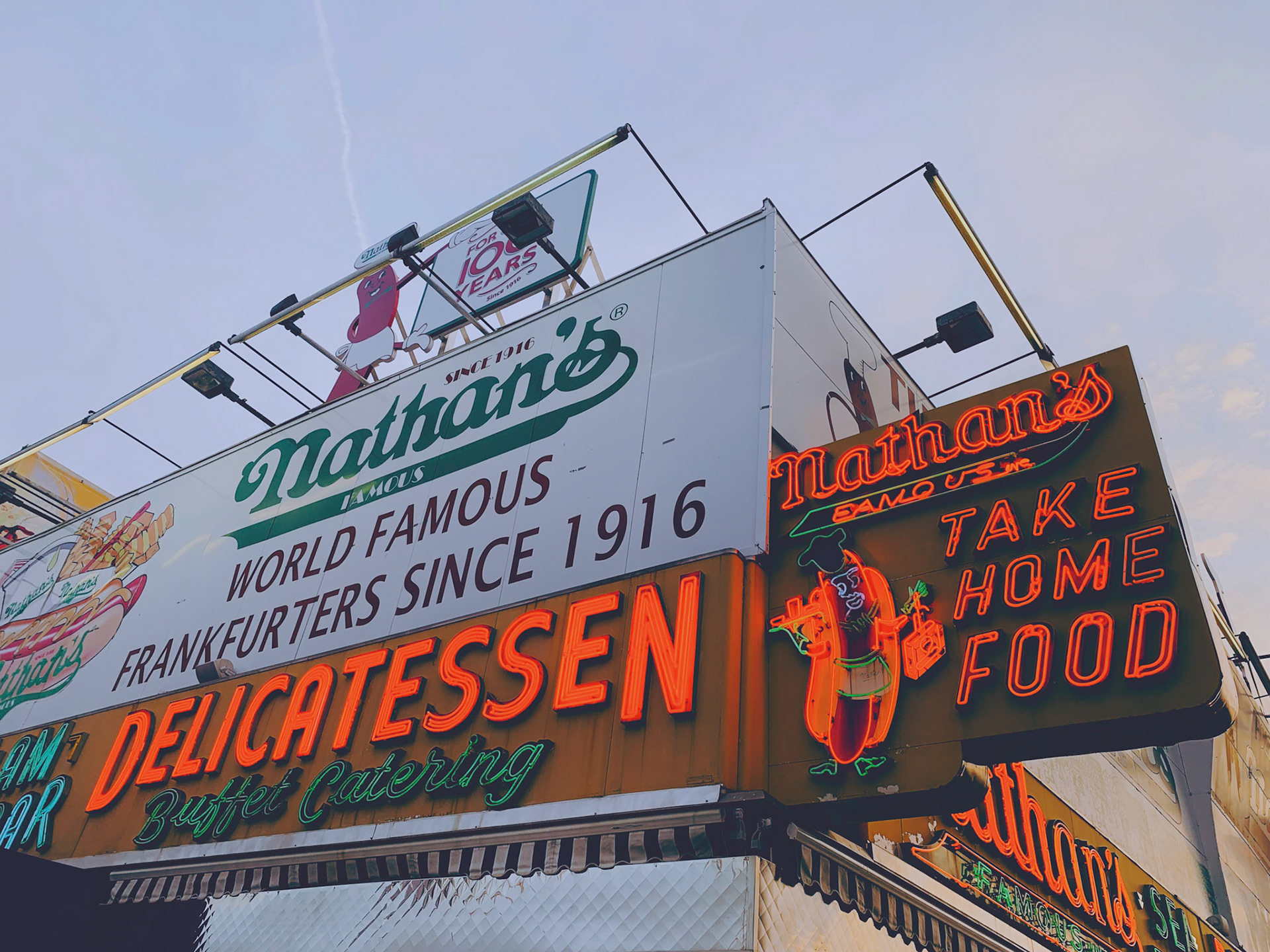 Neon advertising sign of Nathan's Delicatessen, Coney Island, Brooklyn, New York City, USA