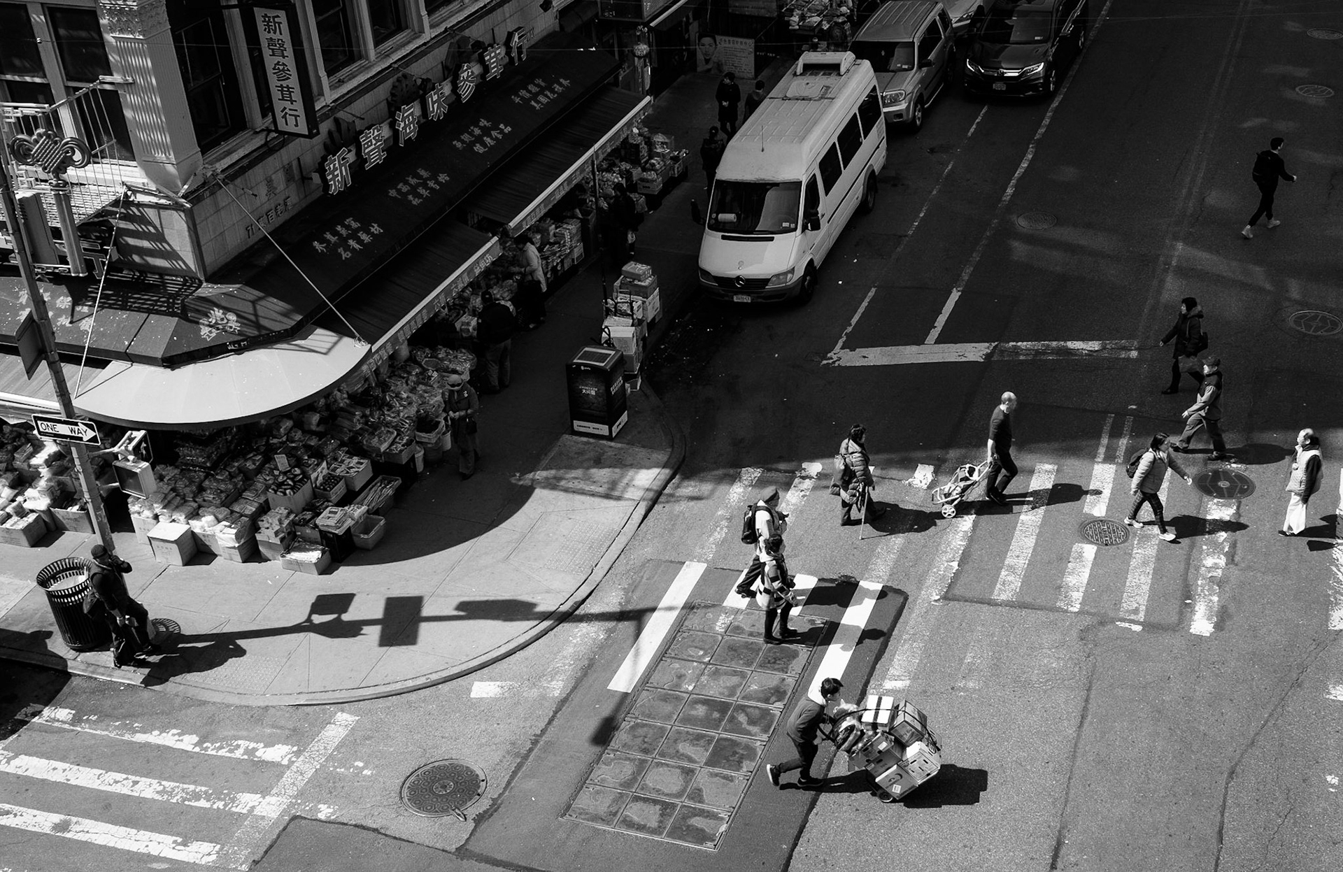 Zebra crossing next to a corner store from above, China Town, Two Bridges, Manhattan, New York City, USA