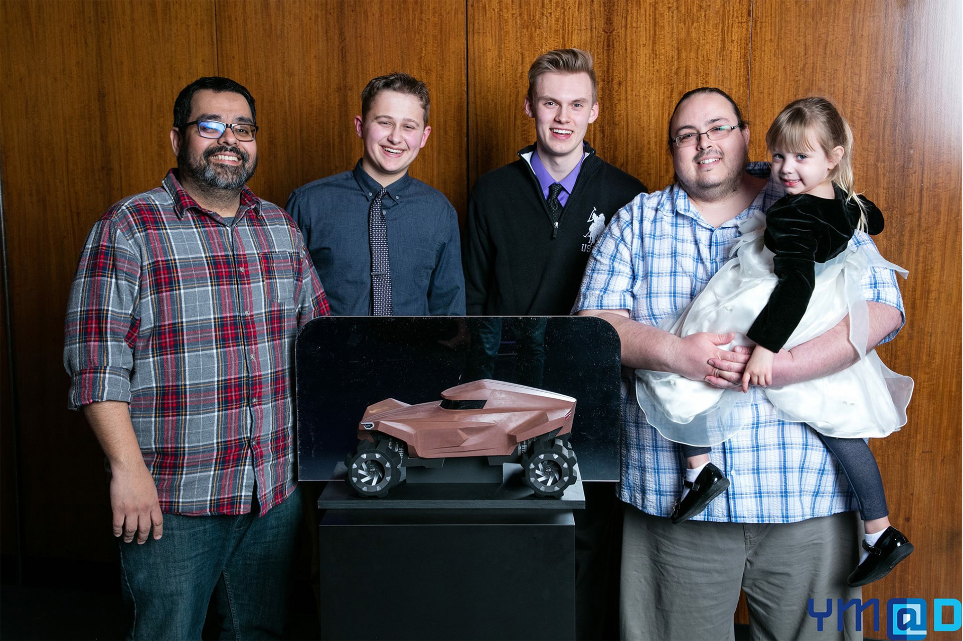 Final group photo directly after student's GM Dome presentation.