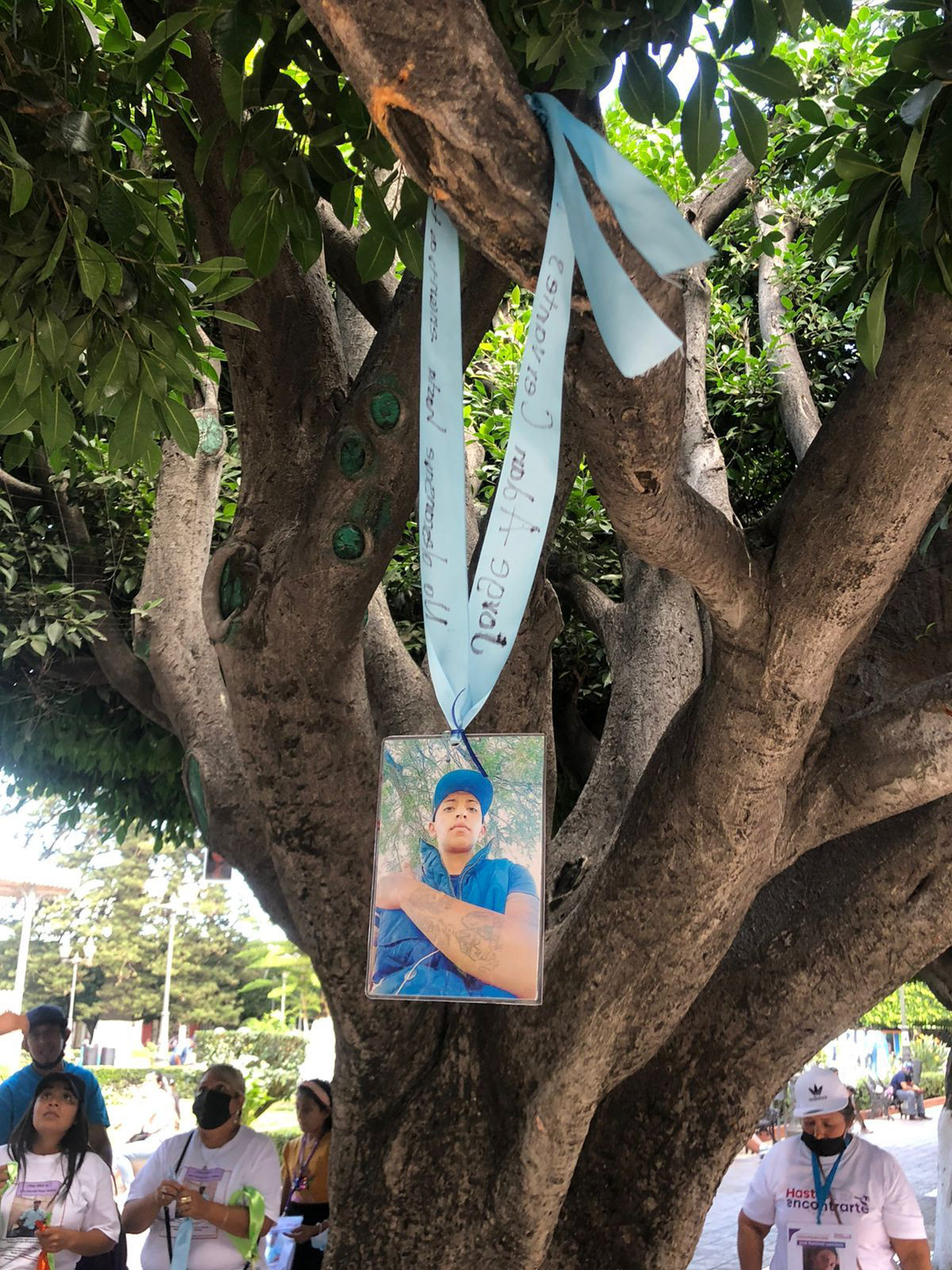 A detail of one of the elements of the Dispersed Memorial, showing the picture of one of the disappeared persons.