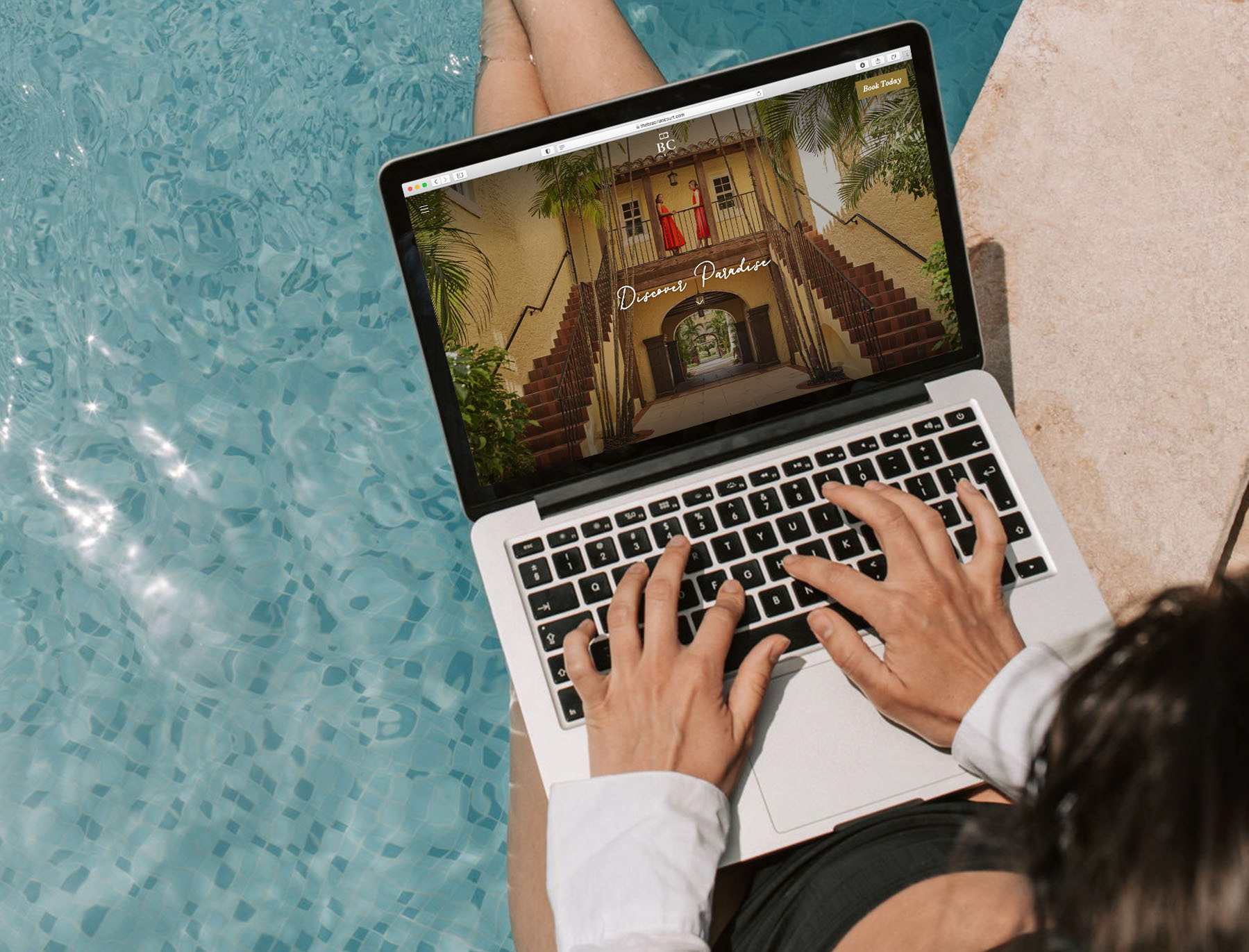 A person viewing the website on a laptop