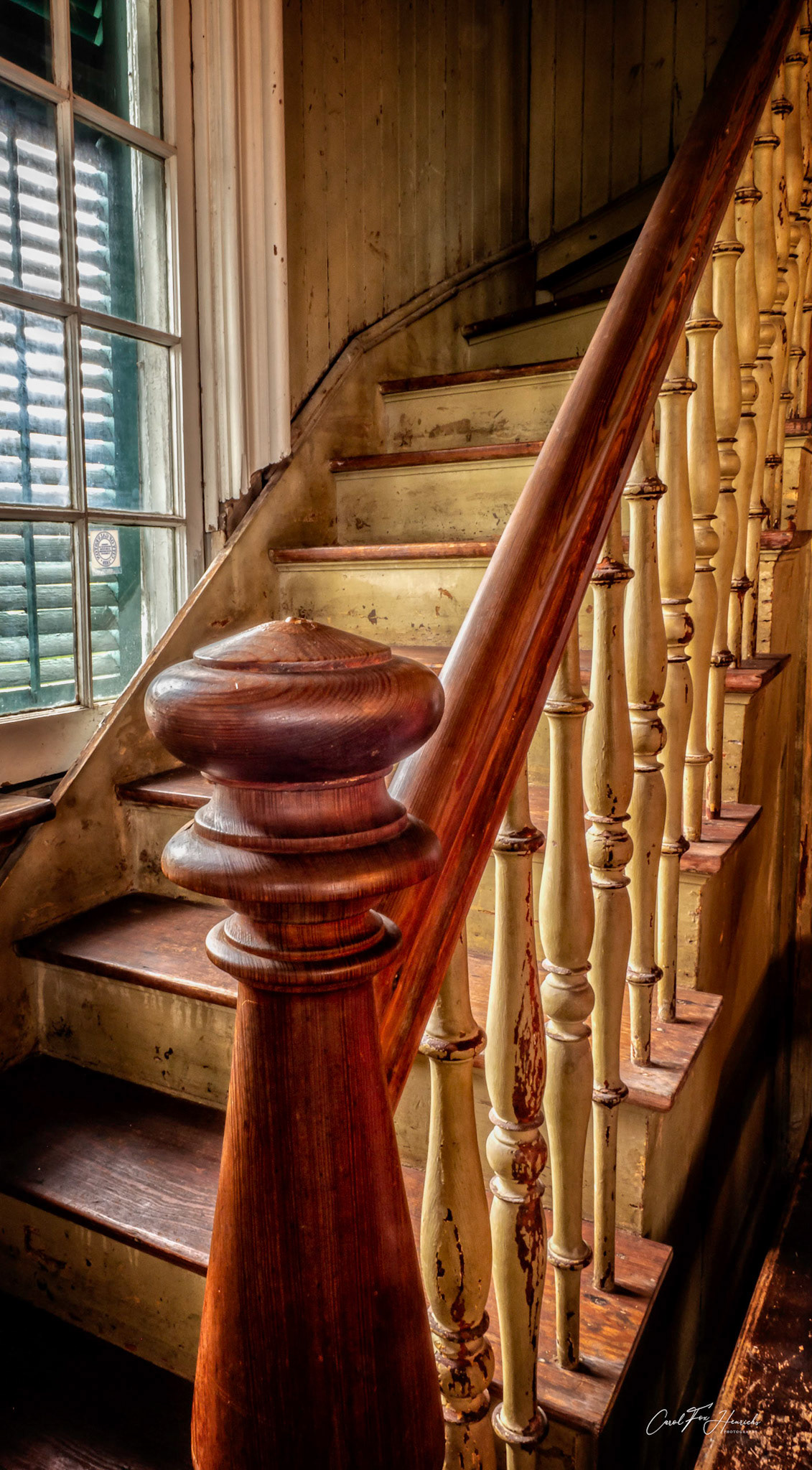 From 1859 until now, how many hands have touched this banister leading to the church balcony?