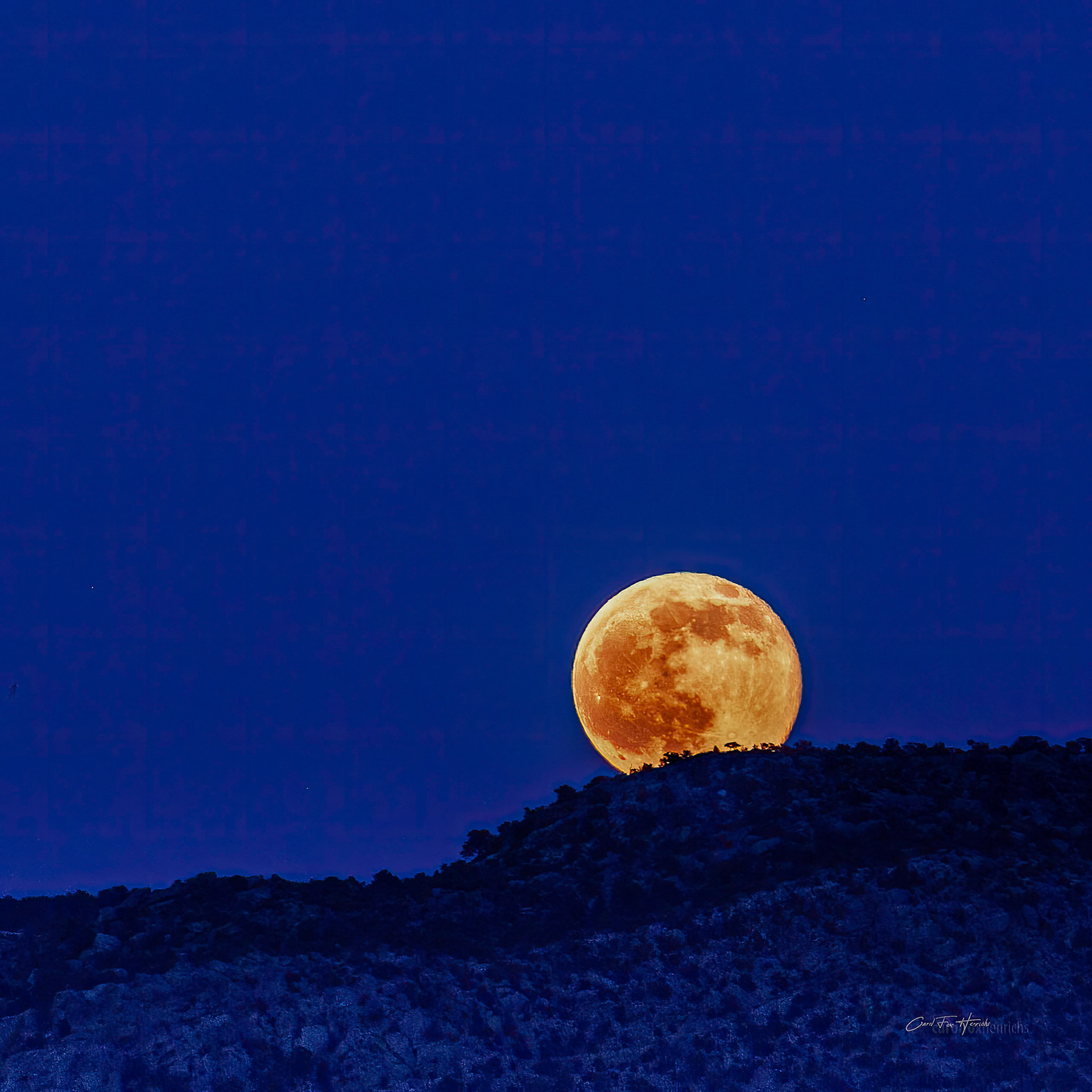 Strawberry moon rising over Fort Defiance, Arizona.