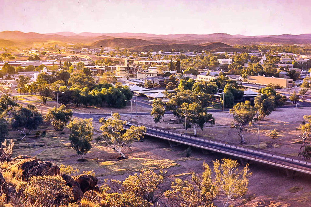 Stark and blistered Alice Springs and a river runs with shame ~ Redgum