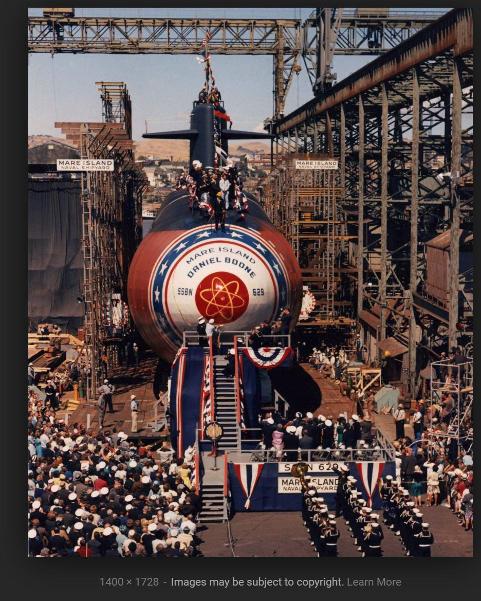 Christening  by Mrs Margaret Wakelin, wife of Assistant Secretary of the Navy James H. Wakelin,on June 22, 19363 of the U.S.S.Danial Boone  SSBN 629 Commissioned April 23, 1964.   (Second ffrom back, middle column on Trumpet.)