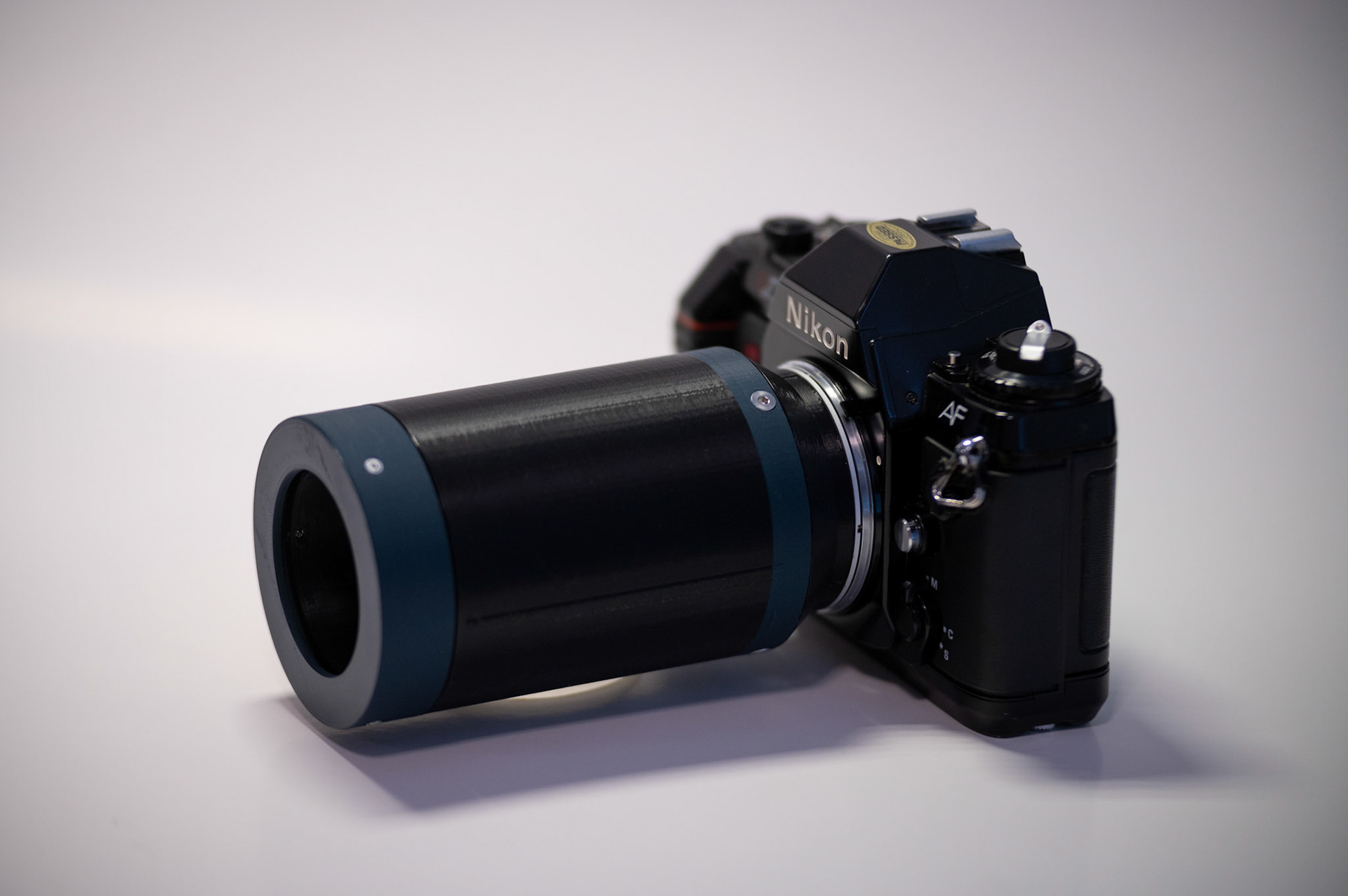 Lens mounted to a N2020