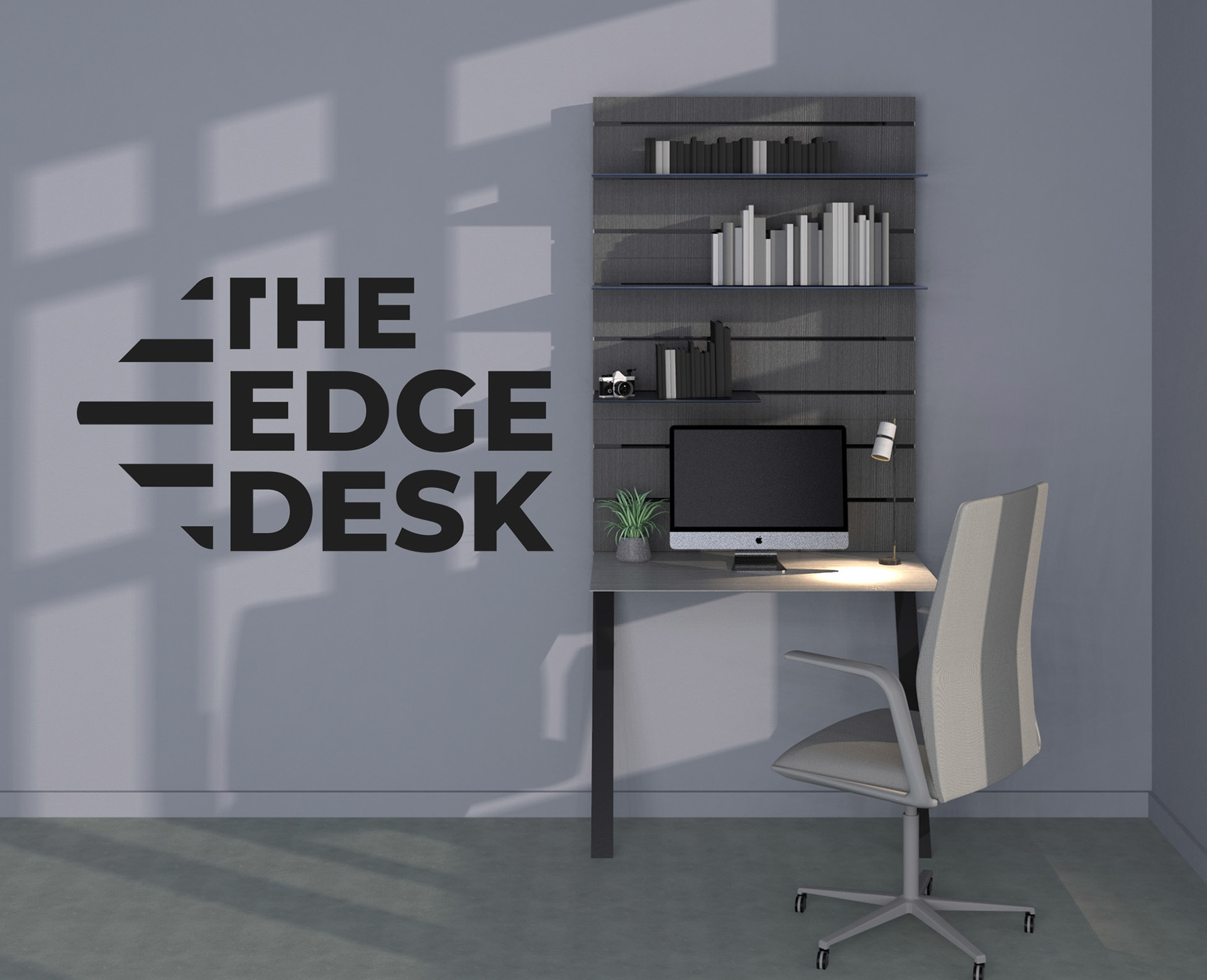Word mark logo and image of the Edge Desk. The desk and the logo appear to be in a room, near the corner with shadows of the desk and the chair in front on the left side of the image, indicating two windows on the wall which is out of scene on the right of the desk. On top of the desk is a computer and some books and other items above on shelving within the desk's modular slots.