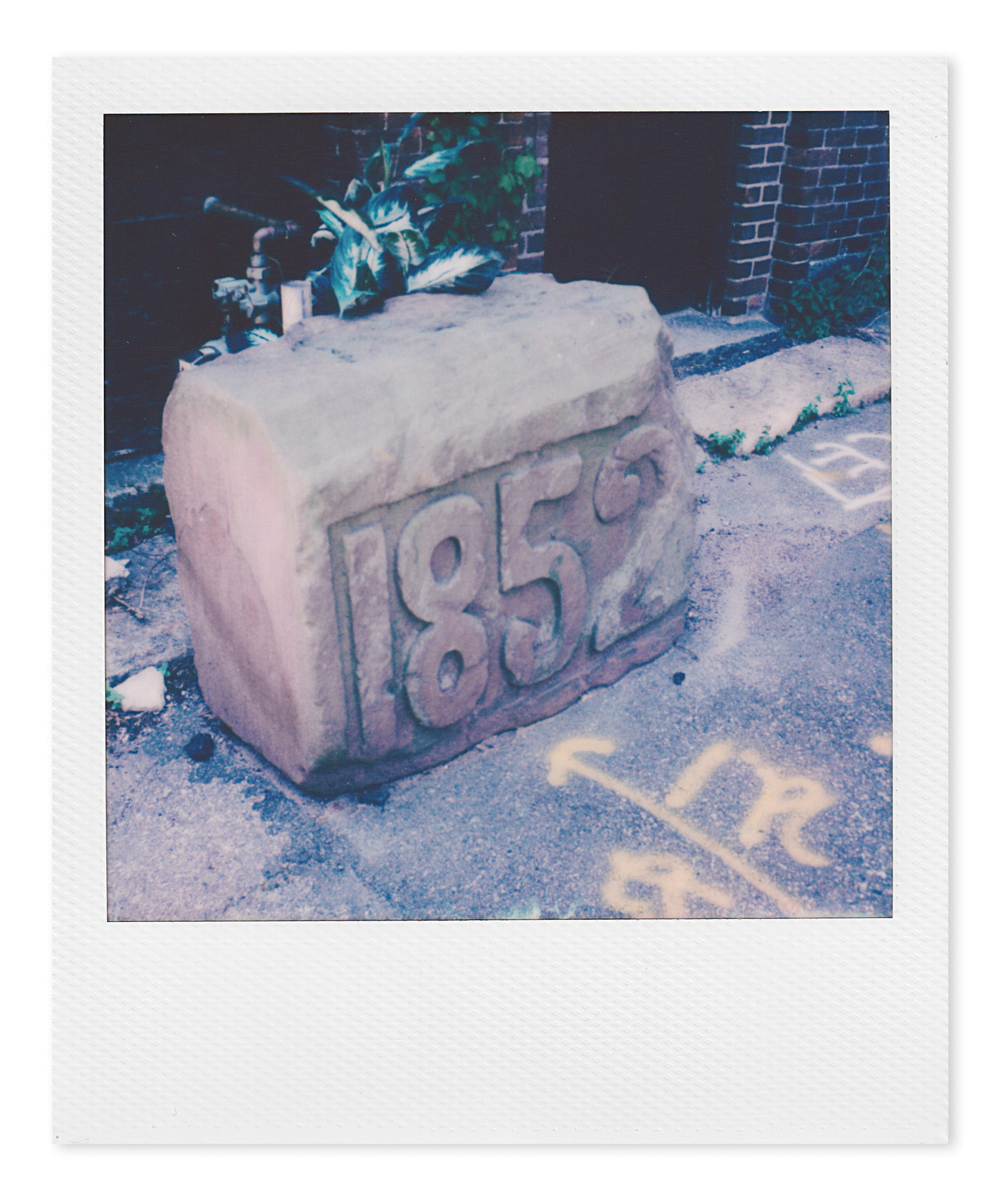 cornerstone behind building on Main Street