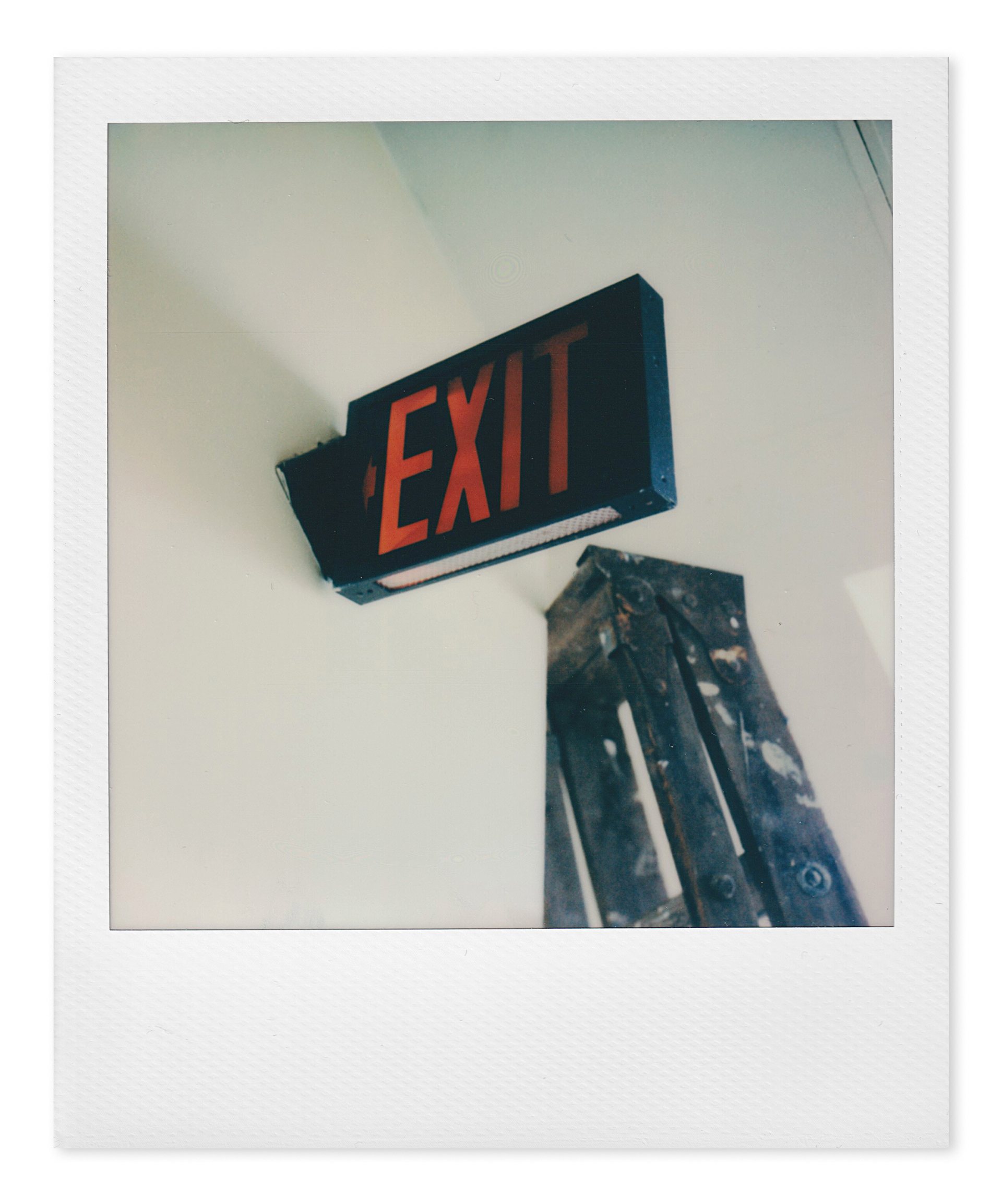 exit sign in building hallway