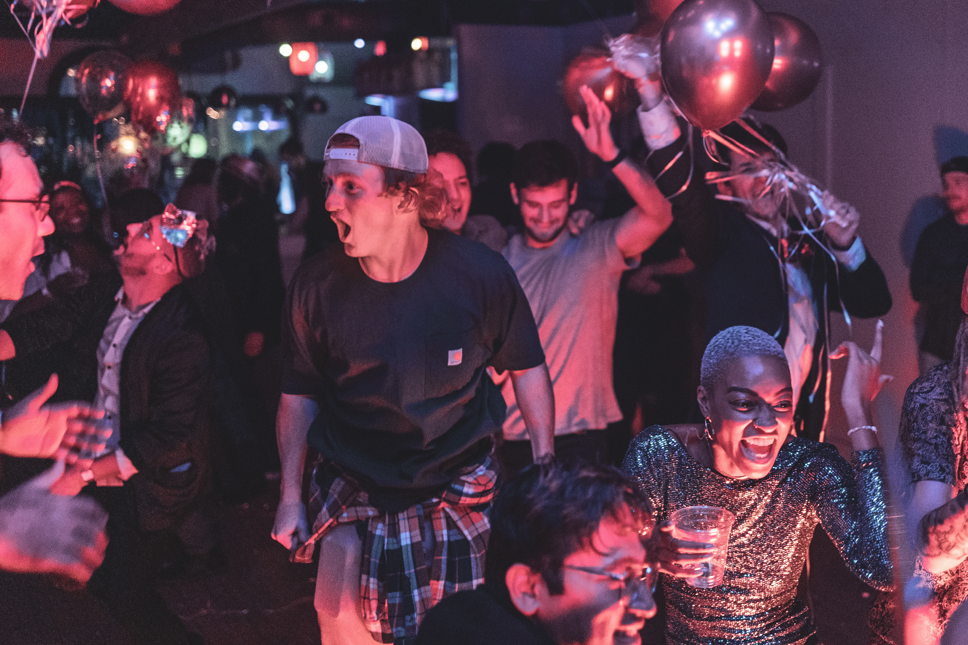 Crowd enjoys live DJ during Strictly Social NC's New Years Eve Masquerade Ball on December 31, 2021. 