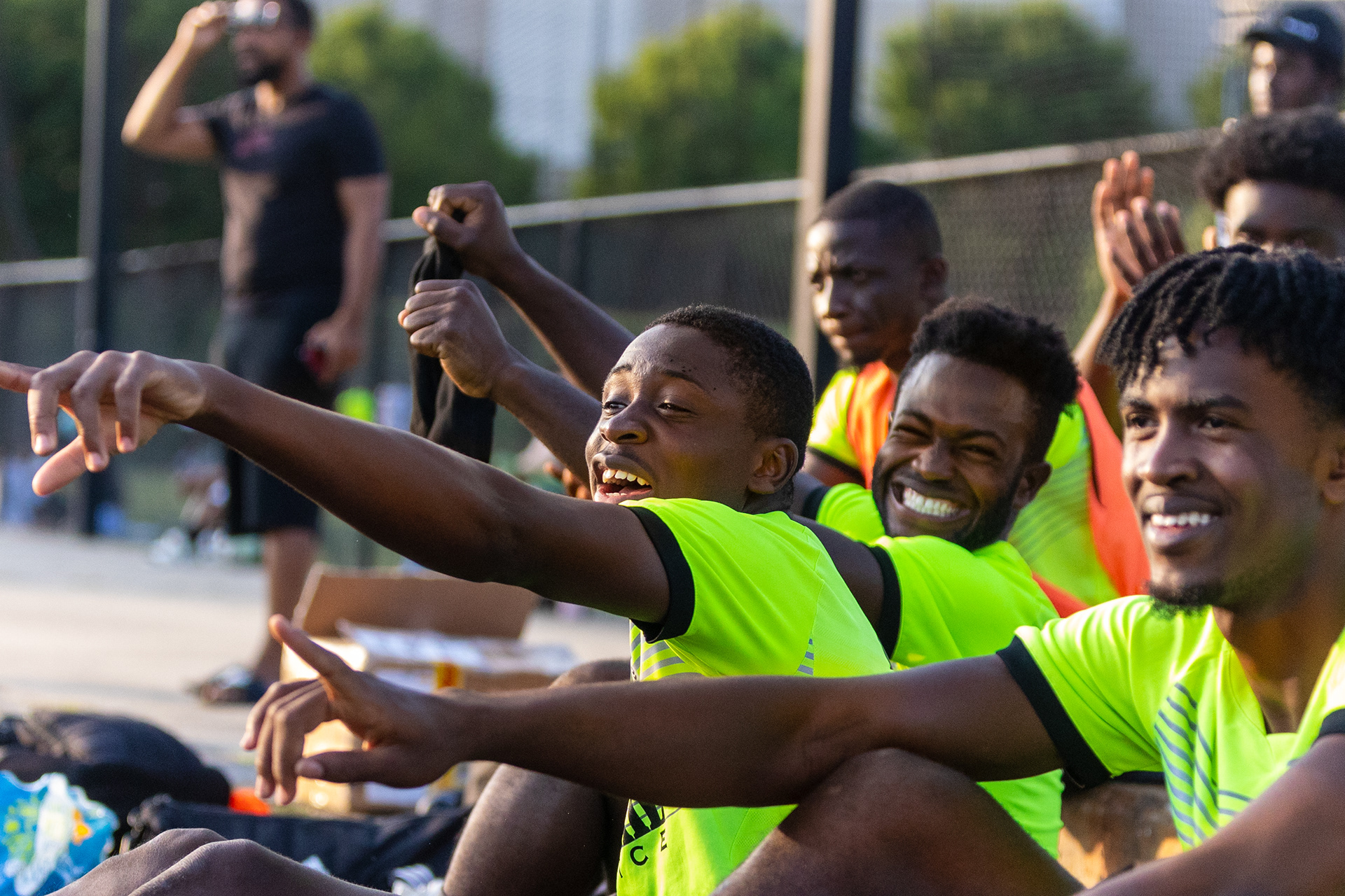 Cedric Dudley (middle), Louis Gozan, and the other Greensboro International Football Club members react to a goal against Lazers Soccer Club on July 10th, 2021 