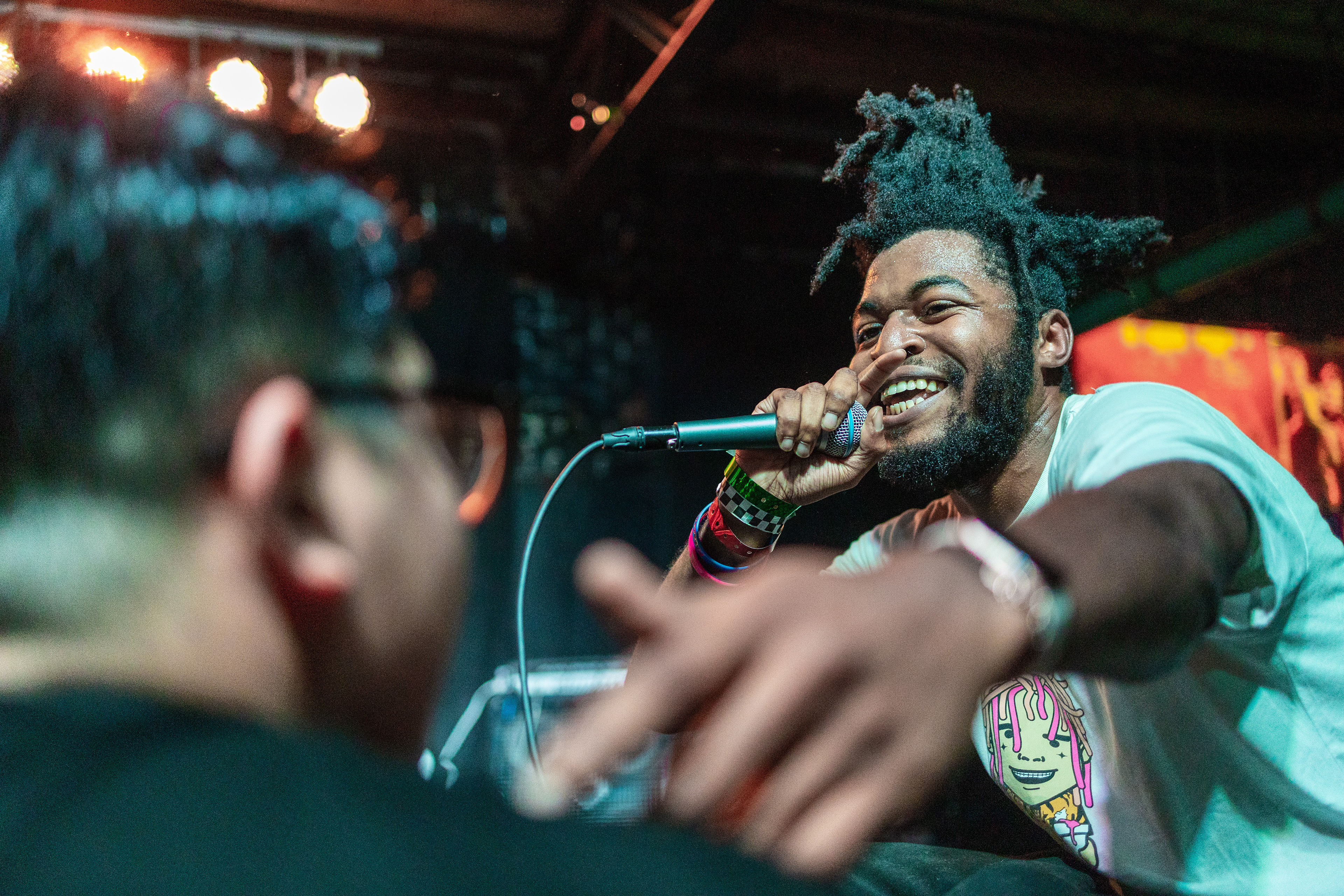 Michael "Hollow Creeper' Cooley (right) preforms on stage to crowd at December In The Carolinas in Durham N.C., on December 21, 2021. 