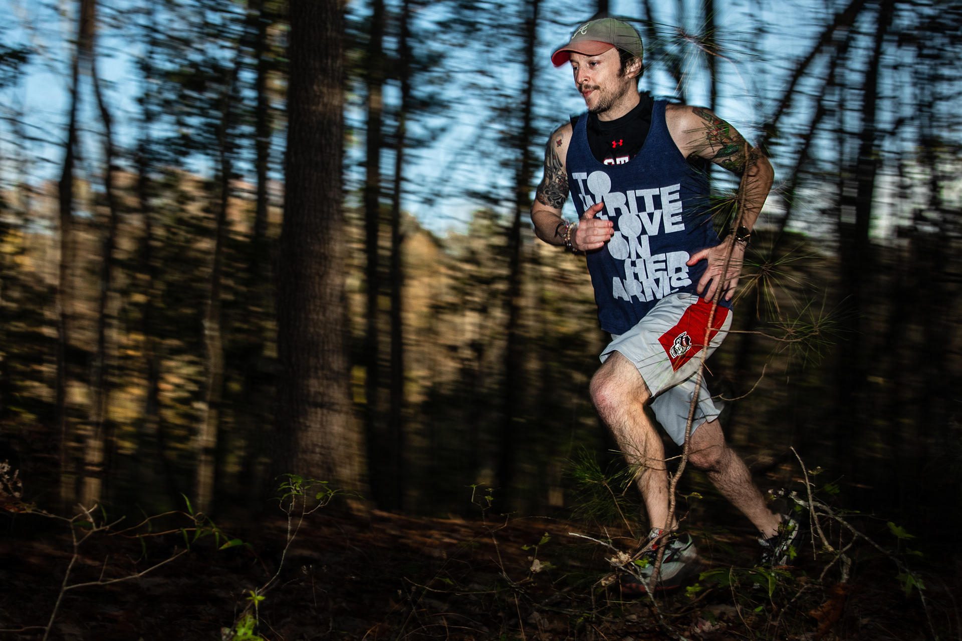 Drew Sykes runs for sportrait photo shoot near Middle Creek Greenway in Apex, N.C., on November 14, 2020
