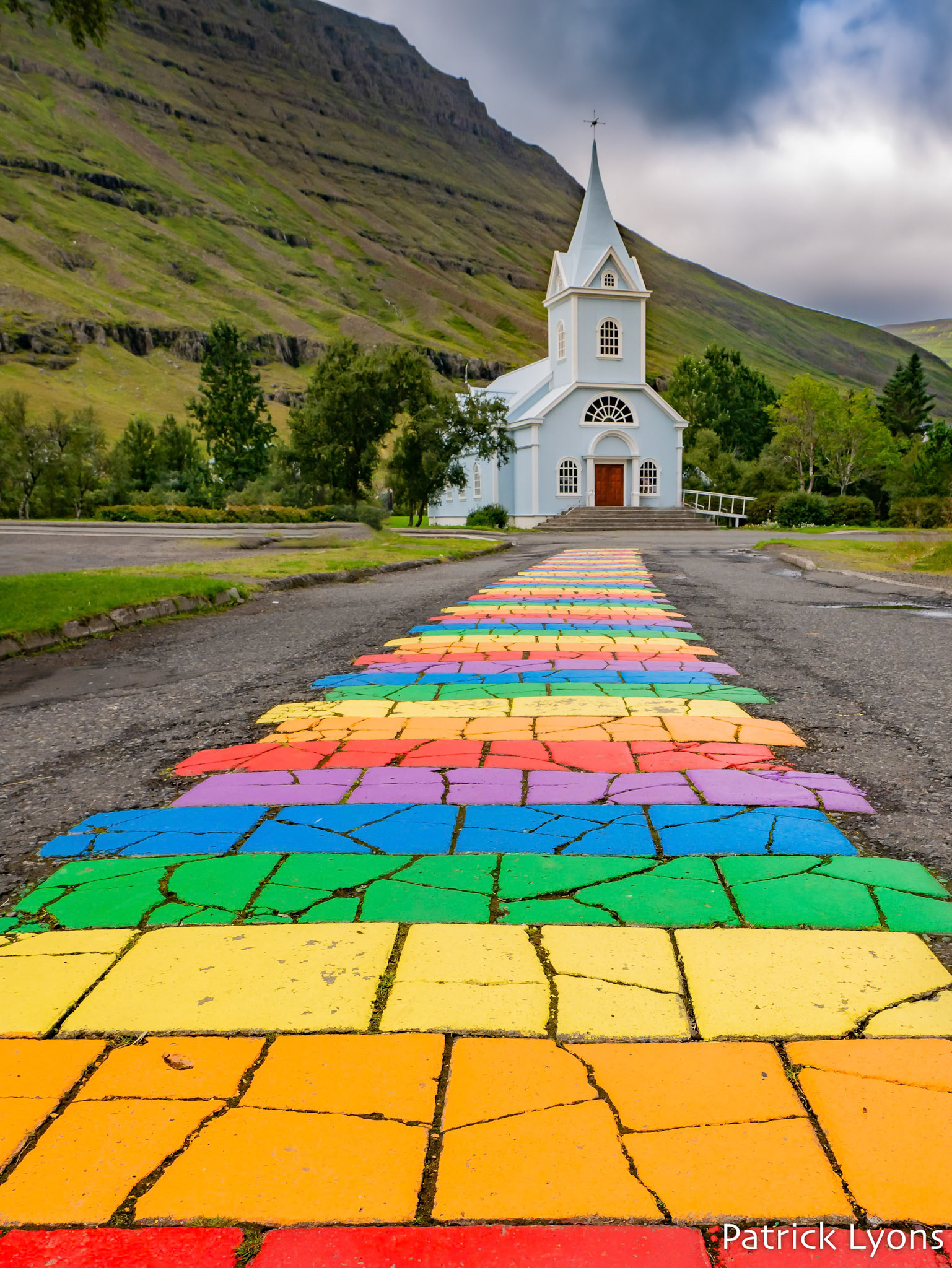 Rainbow steps leading up to a church in Seyðisfjörður, Iceland