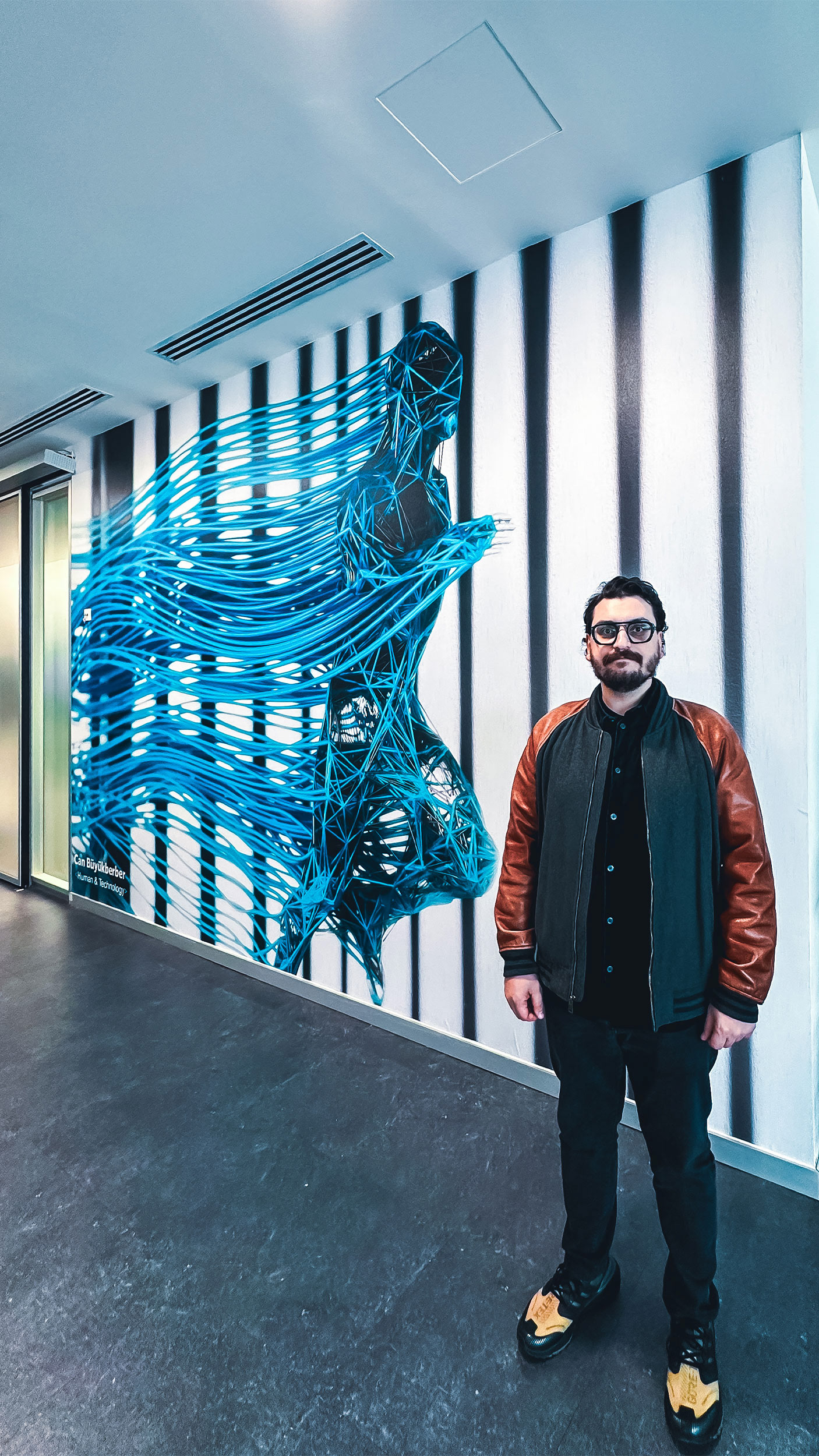 Large digital prints are on display at the Togg Campus